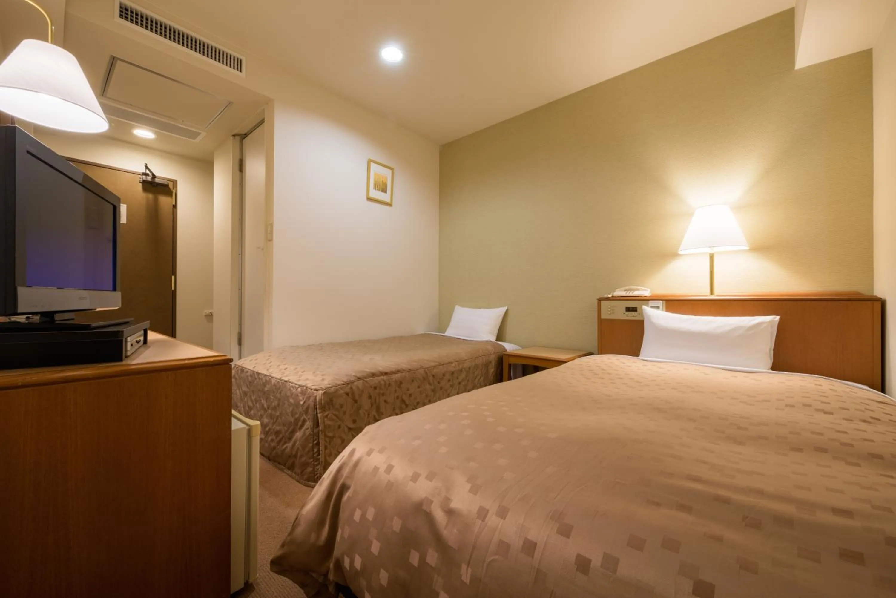 Photo of the whole room, Bed in Pacific Hotel Shiroishi