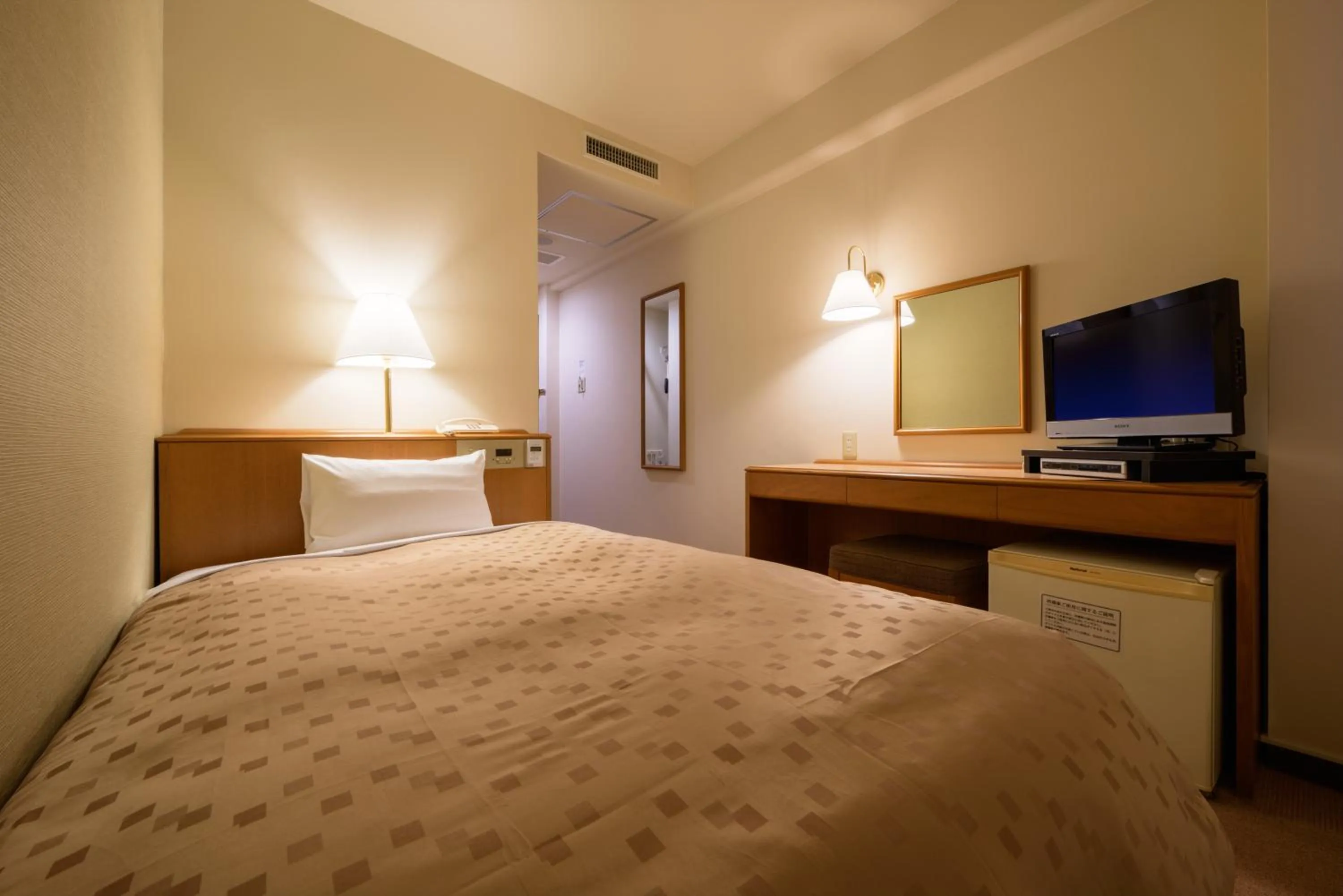 Photo of the whole room, Bed in Pacific Hotel Shiroishi