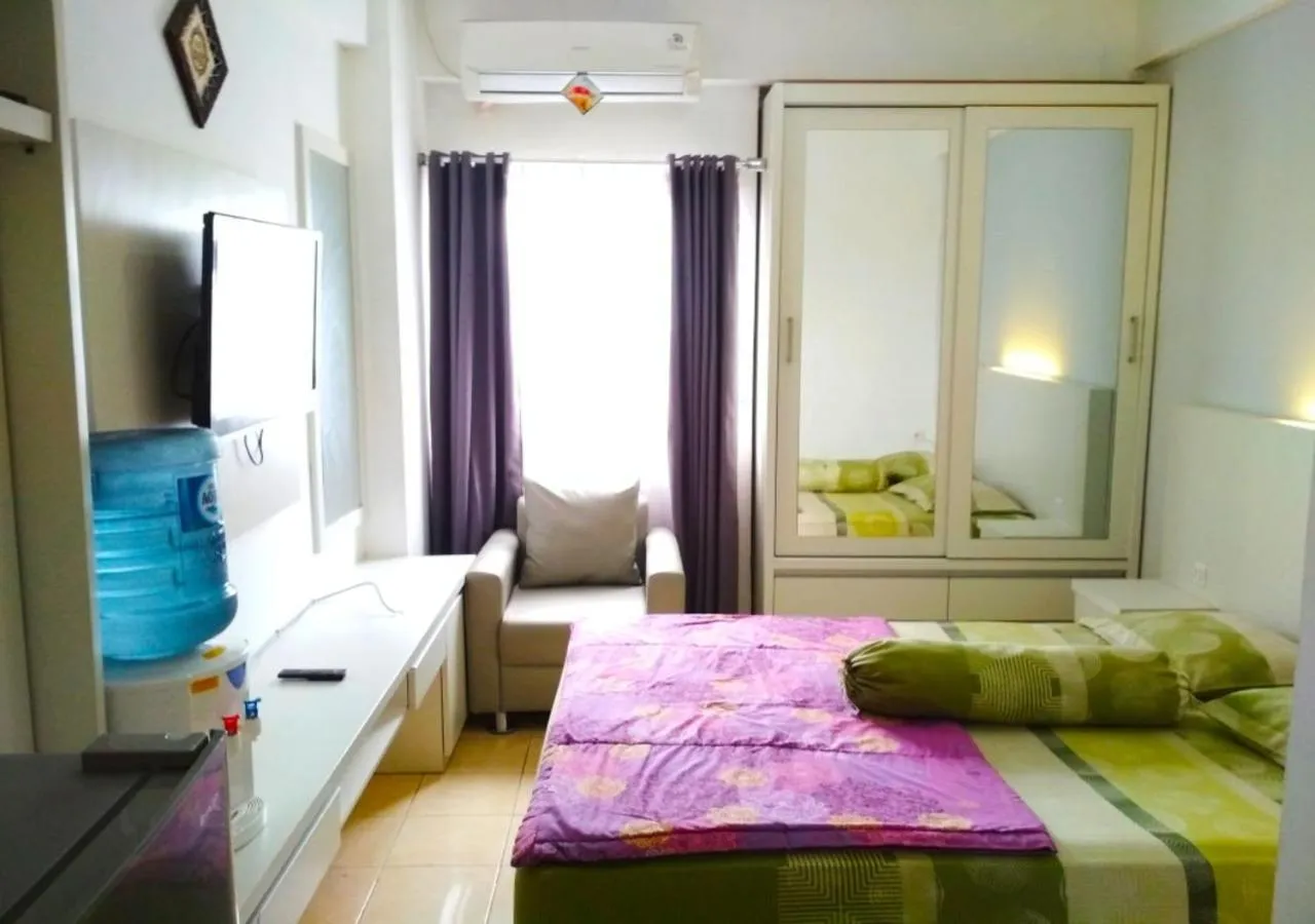 Bedroom, Bed in The suites Metro Apartment by Desta Farispro