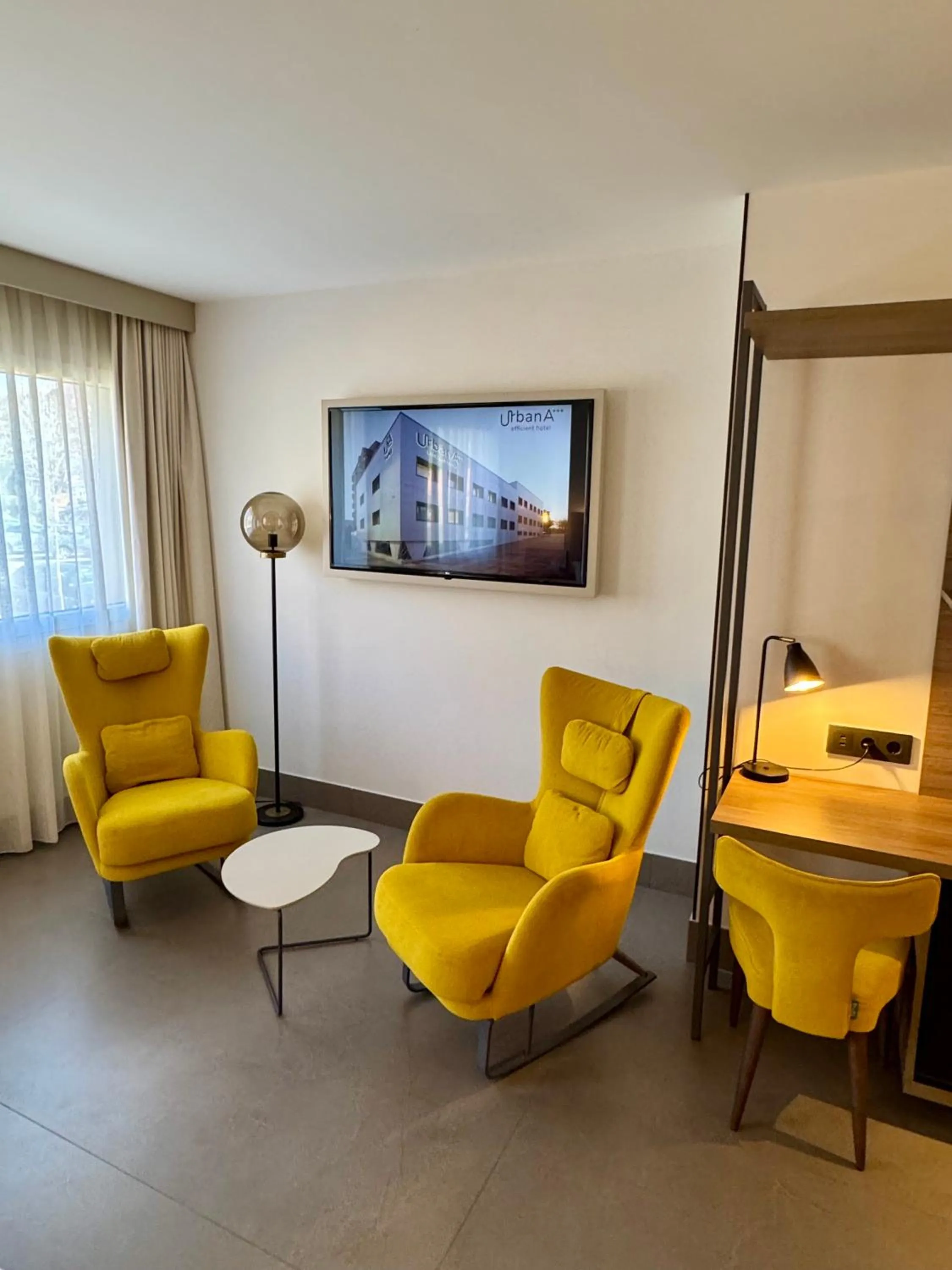 Living room in Urban A+++ Hotel