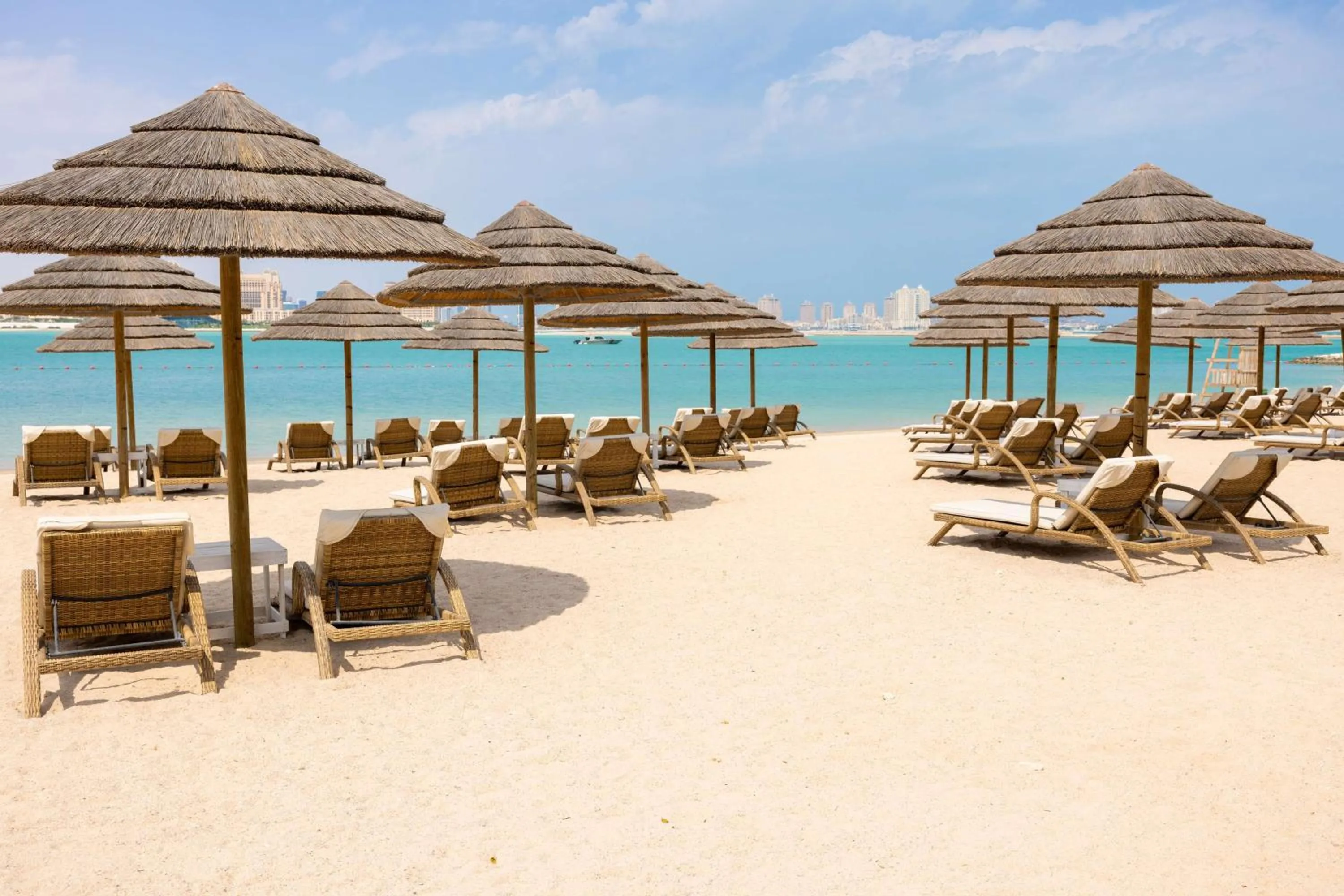 Beach in Aleph Doha Residences, Curio Collection By Hilton