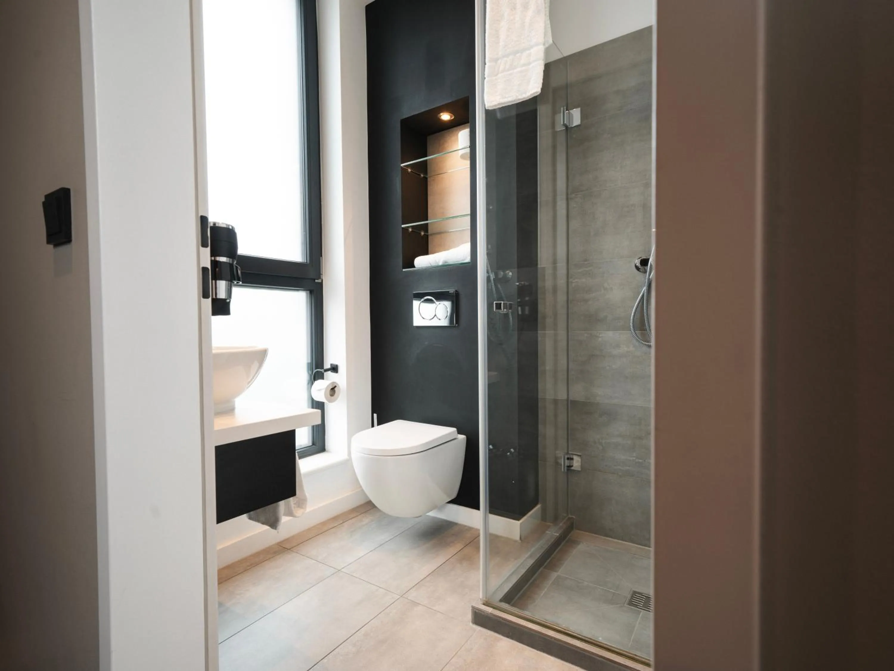 Shower in JustStay Grevenbroich Hotel & Apartments