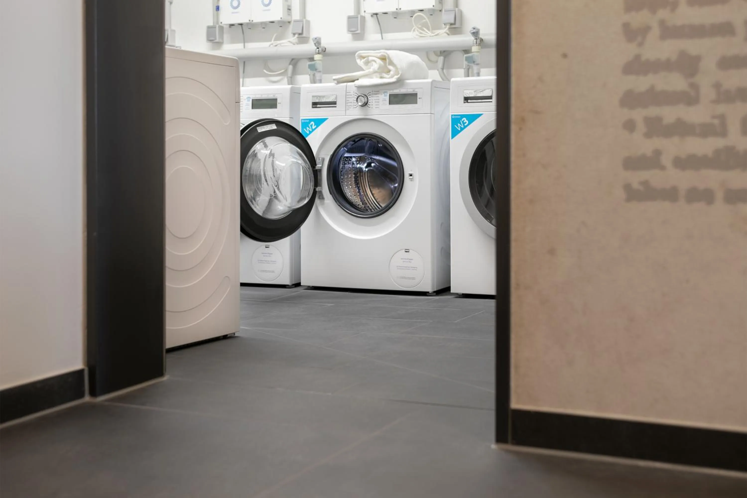 washing machine in Brera Serviced Apartments Ulm