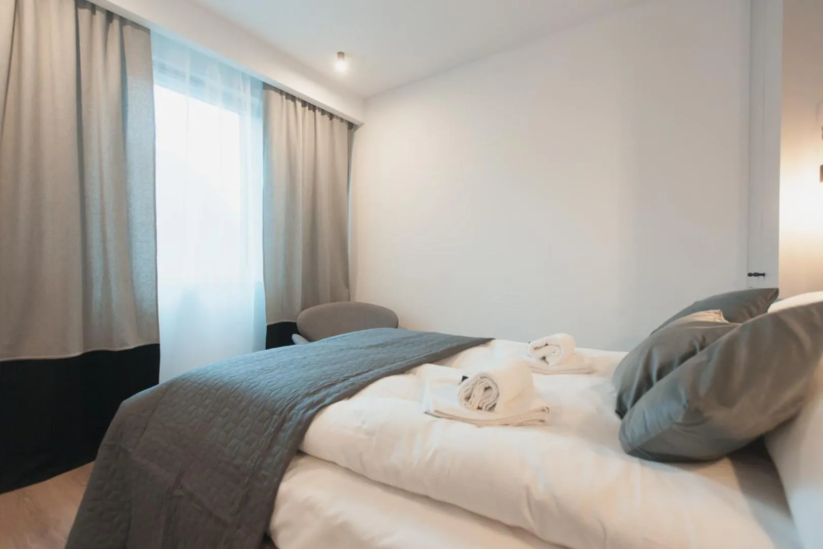 Bed in City Break Atelier Praga Apartamenty