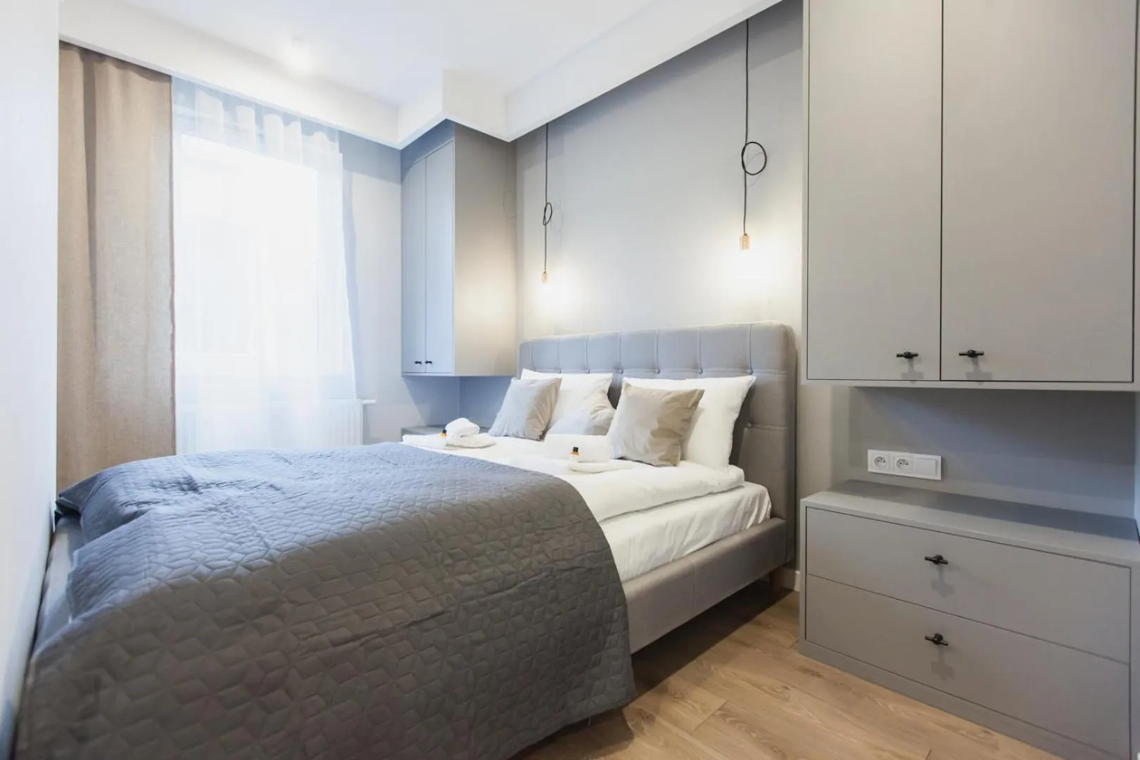 Bed in City Break Atelier Praga Apartamenty