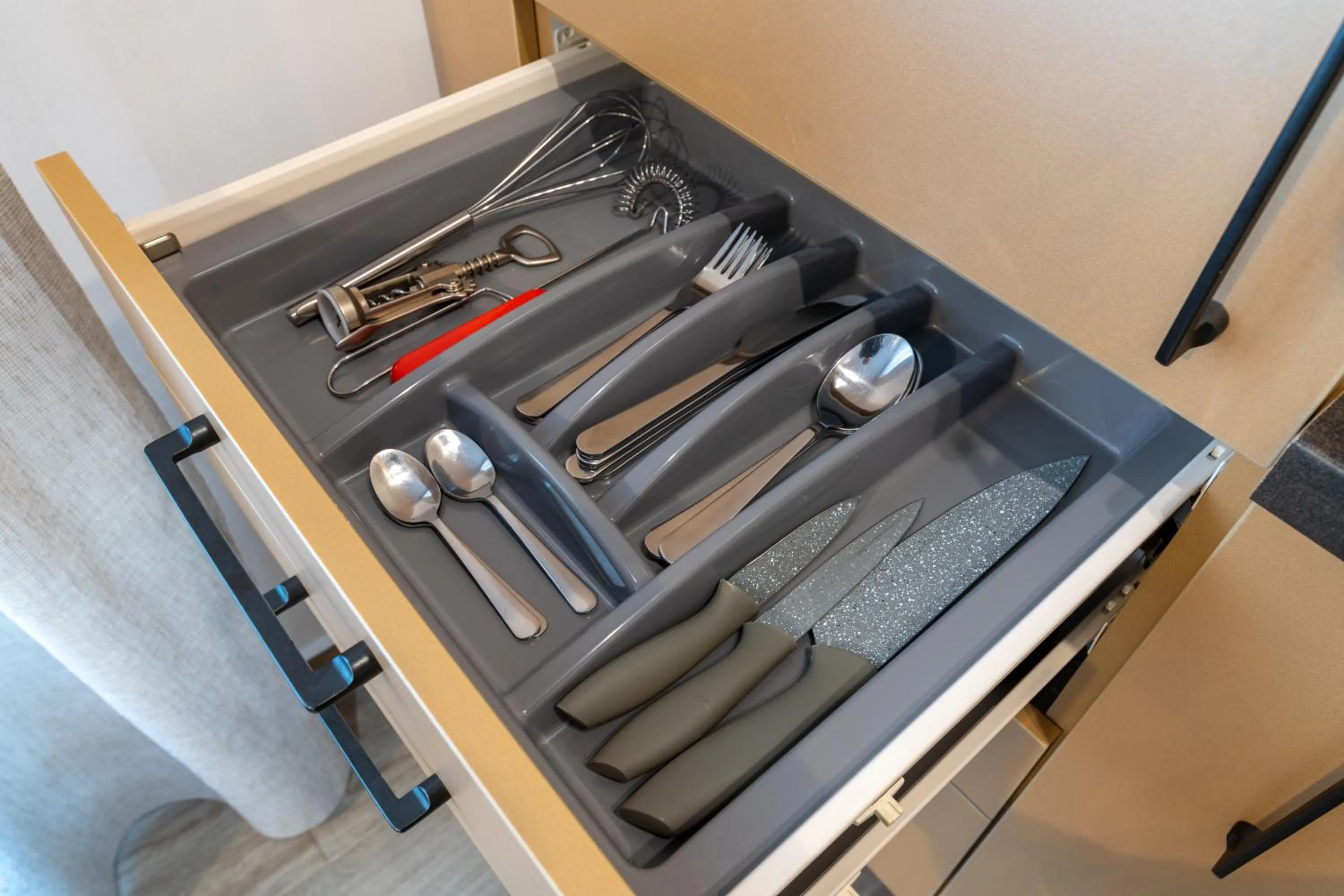 Kitchen or kitchenette in TCI Apartments