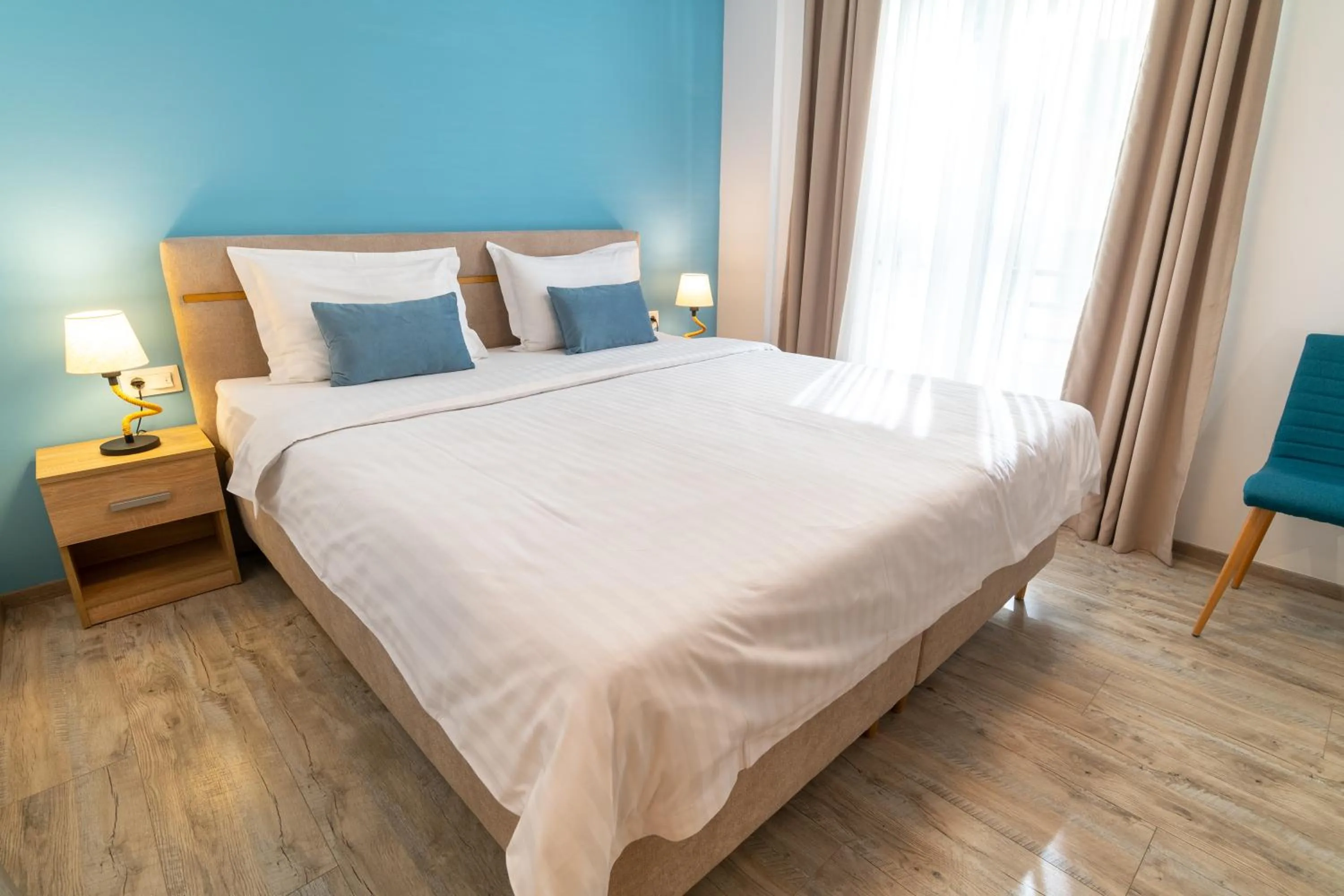 Bedroom, Bed in TCI Apartments