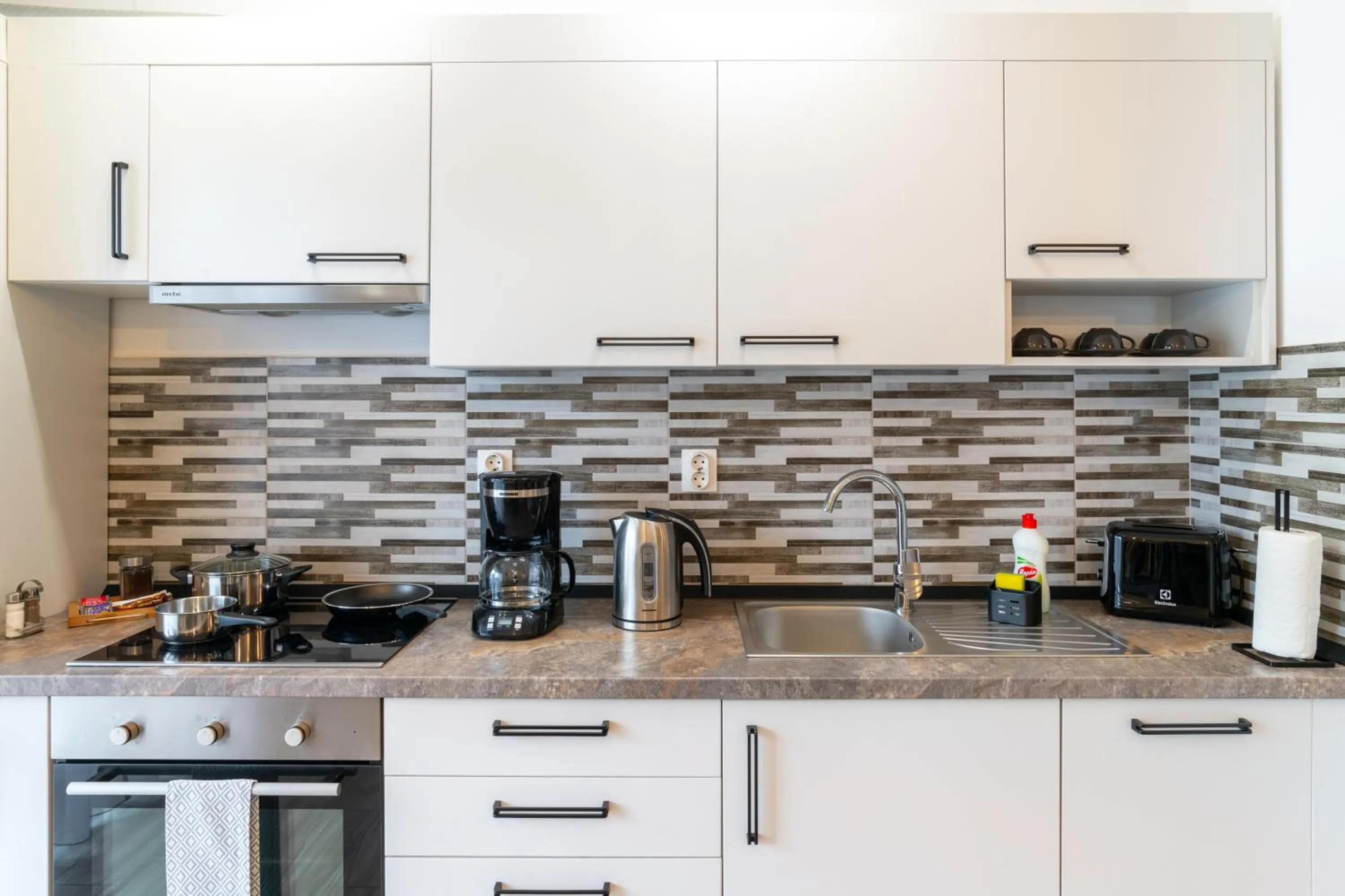 kitchen in TCI Apartments