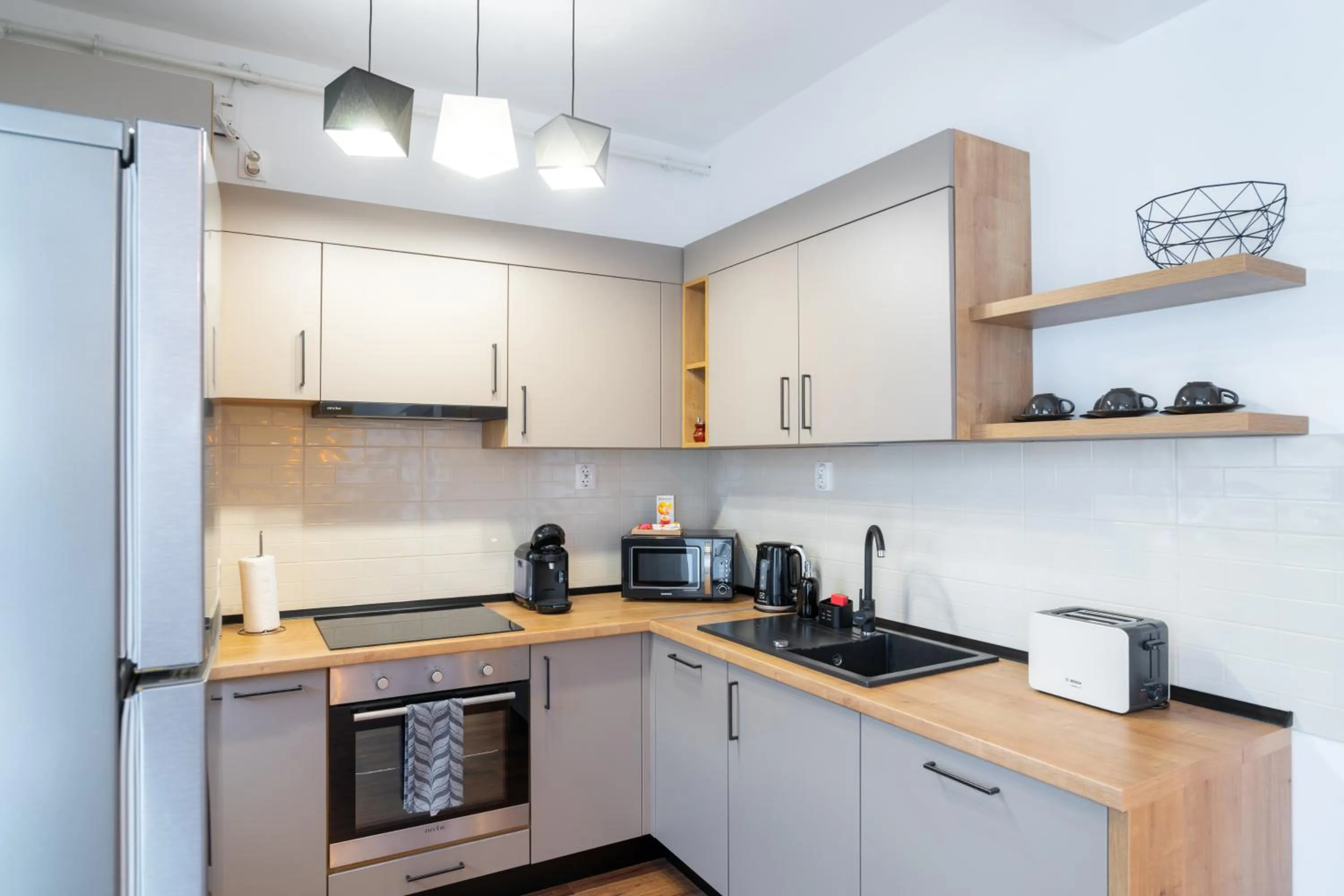 Kitchen or kitchenette in TCI Apartments