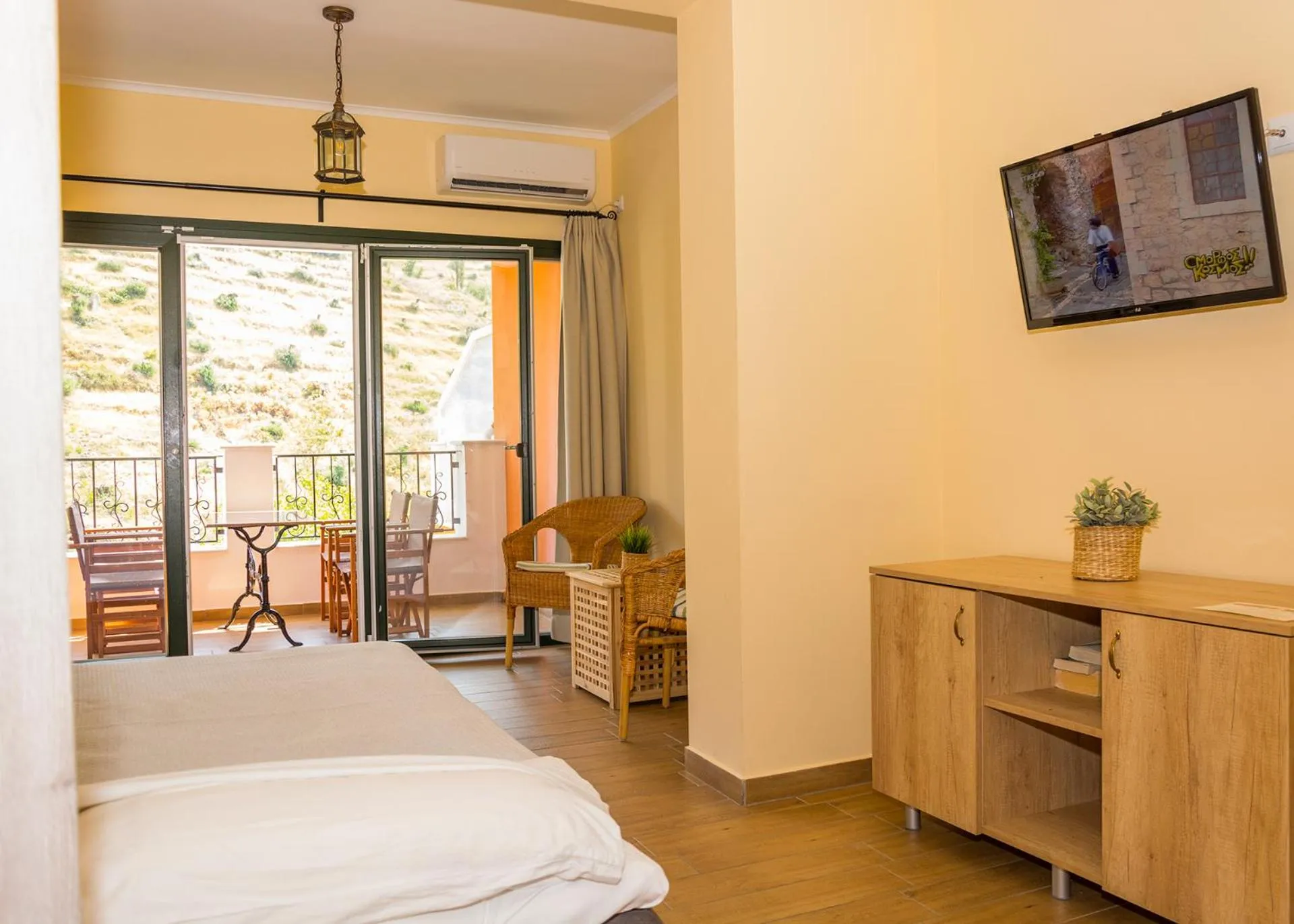 Living room, Bed in Donatos Apartments & Studios