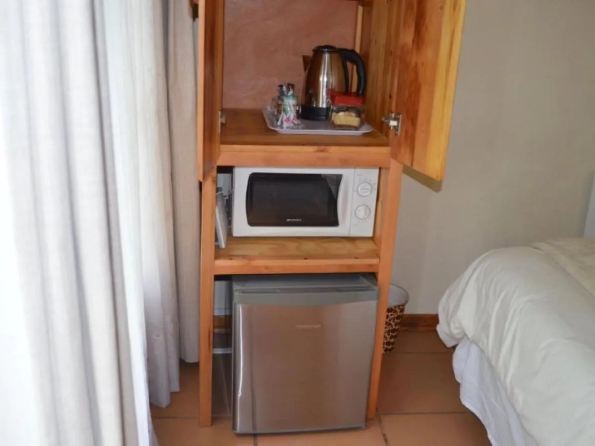 minibar, Bed in The Riverhouse Guesthouse