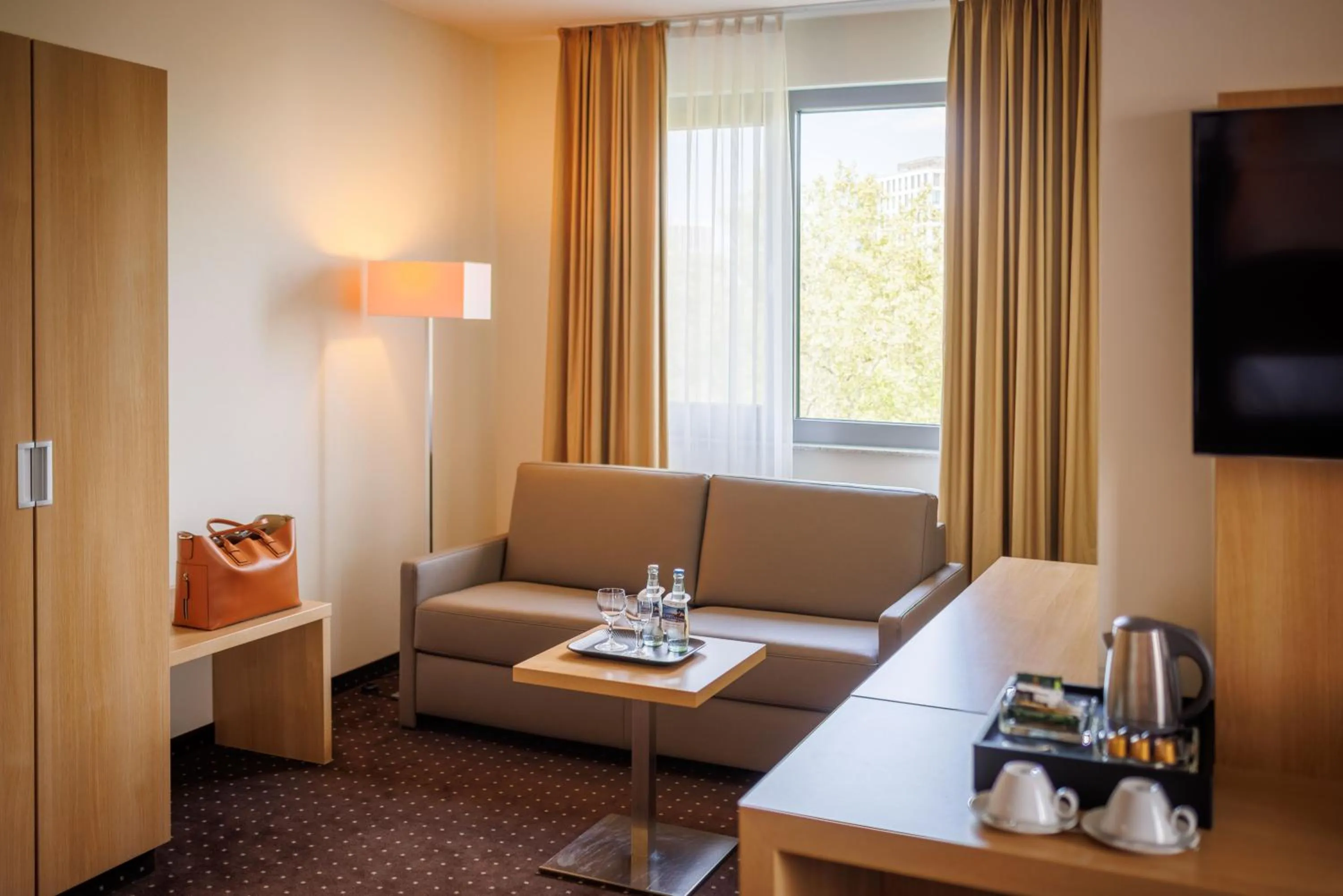 Living room in Lanzcarré Hotel Mannheim, a member of Radisson Individuals