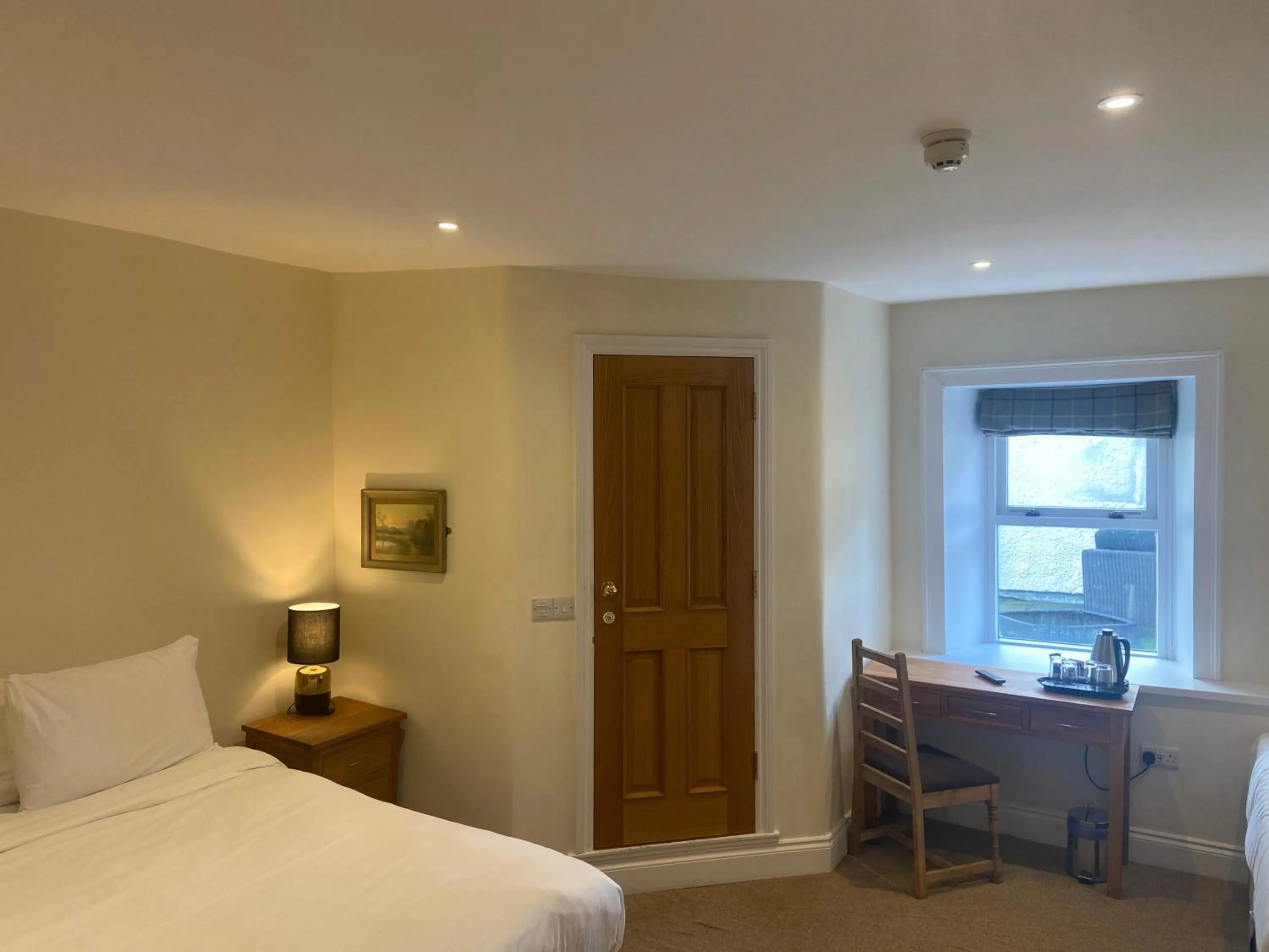 Bedroom in The Greyhound Hotel