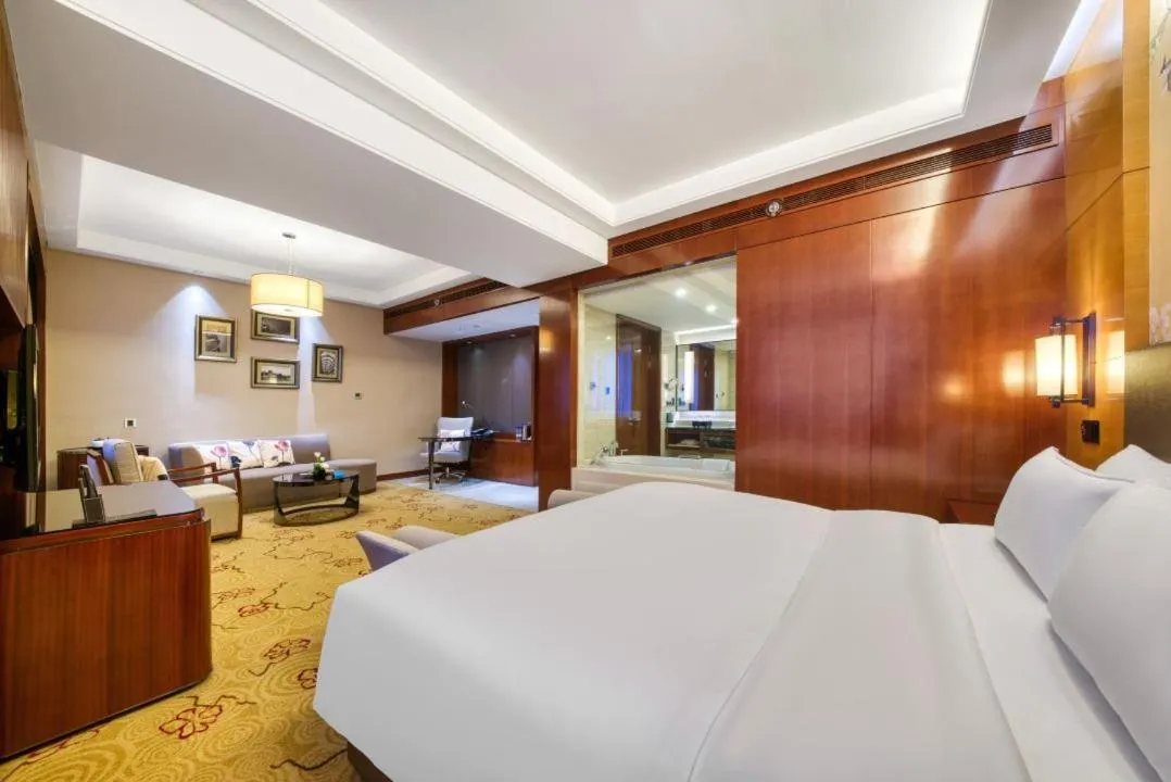 Photo of the whole room, Bed in Sofitel Silver Plaza Jinan