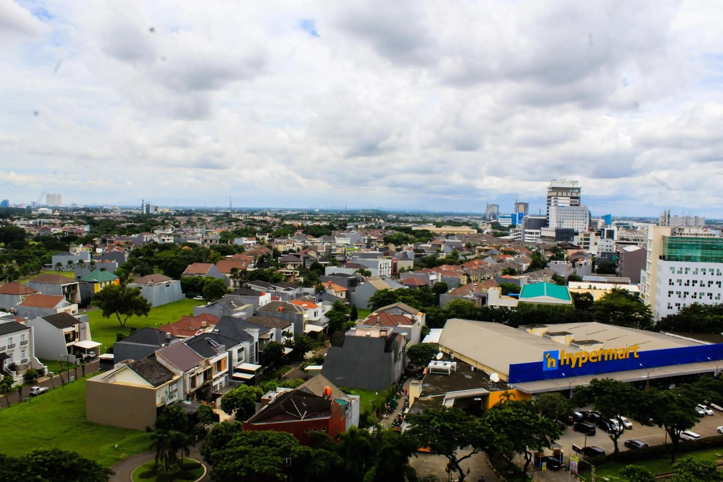 Minimalist 1BR Apartment at M-Town Signature By Travelio