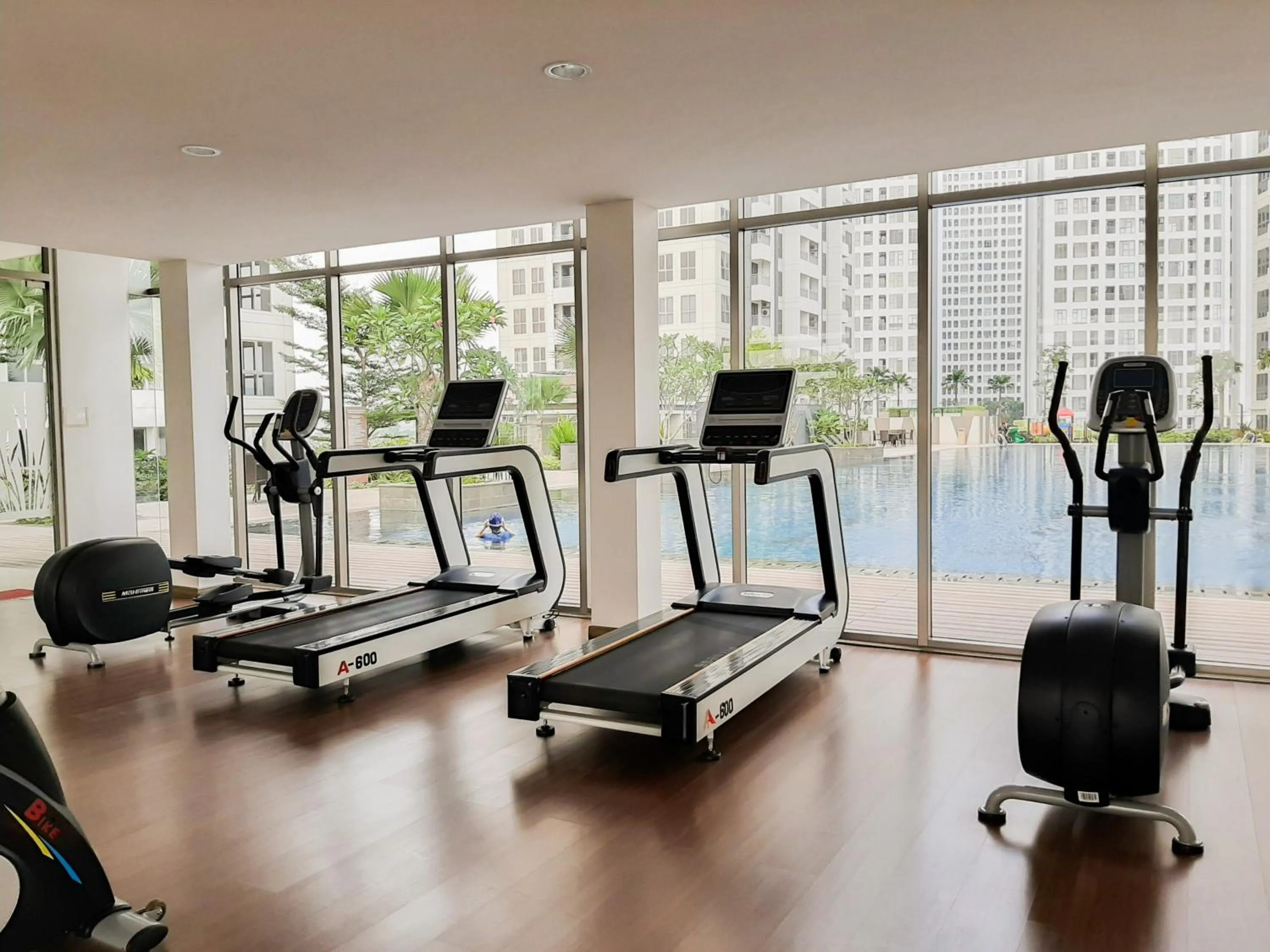 Fitness centre/facilities in Minimalist 1BR Apartment at M-Town Signature By Travelio