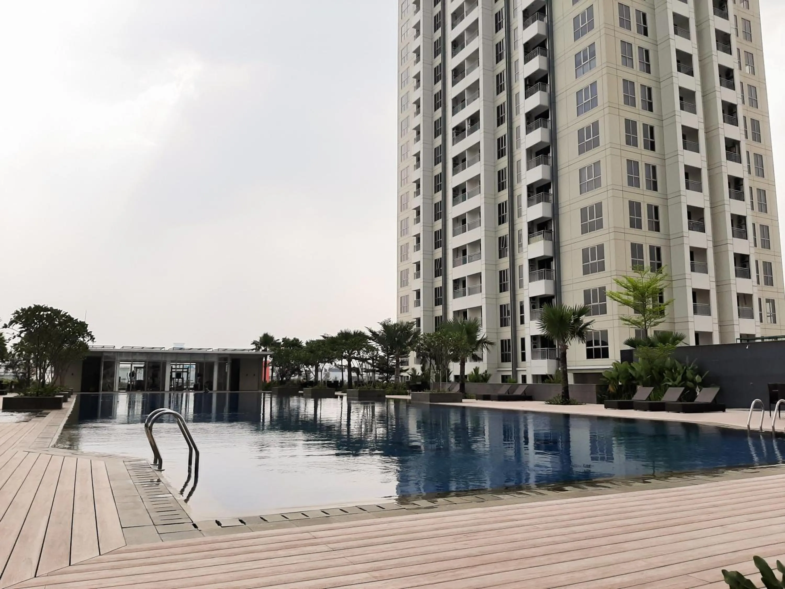 Property building in Minimalist 1BR Apartment at M-Town Signature By Travelio