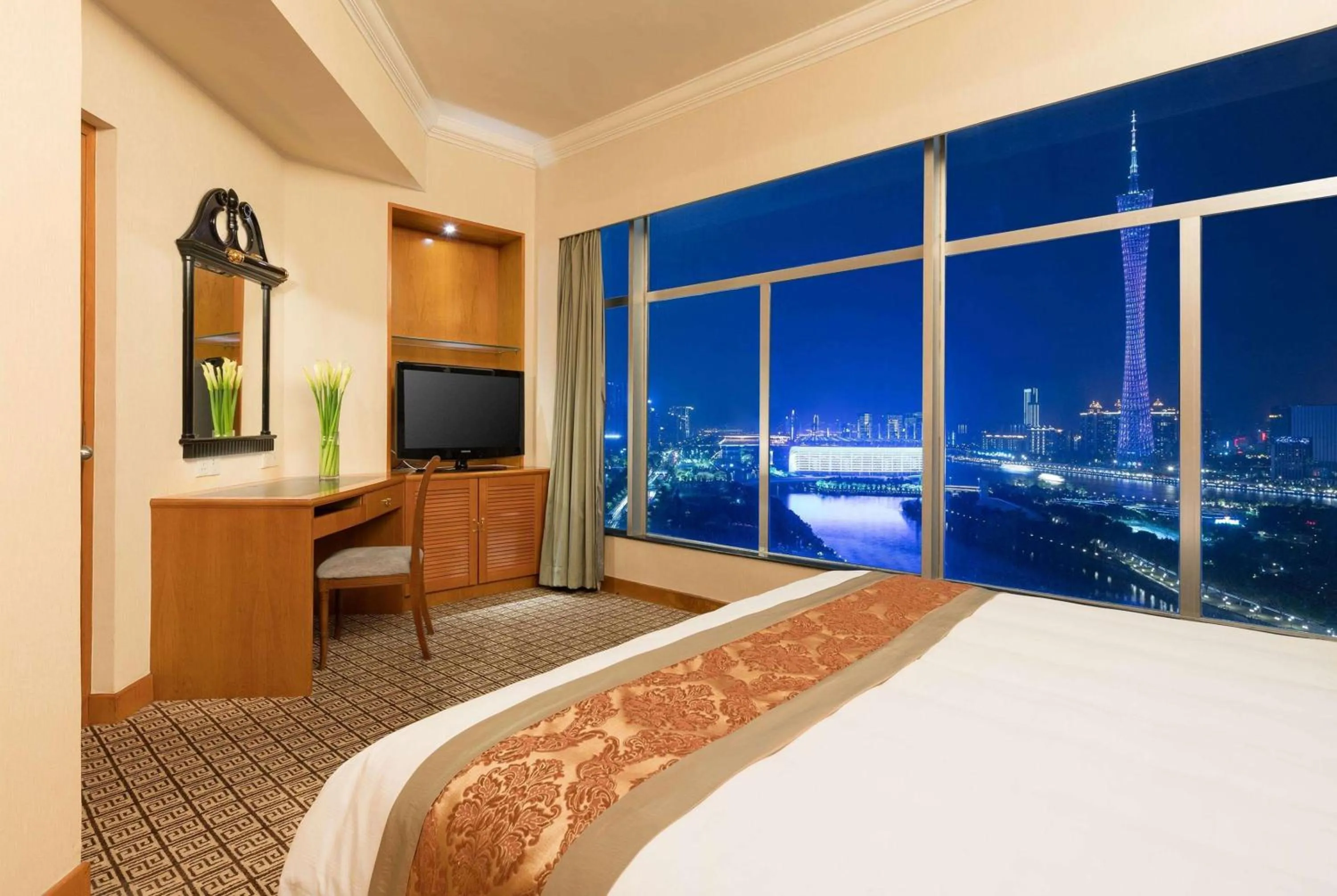Photo of the whole room, Bed in Ramada by Wyndham Pearl Guangzhou-Canton Fair Free Shuttle Bus