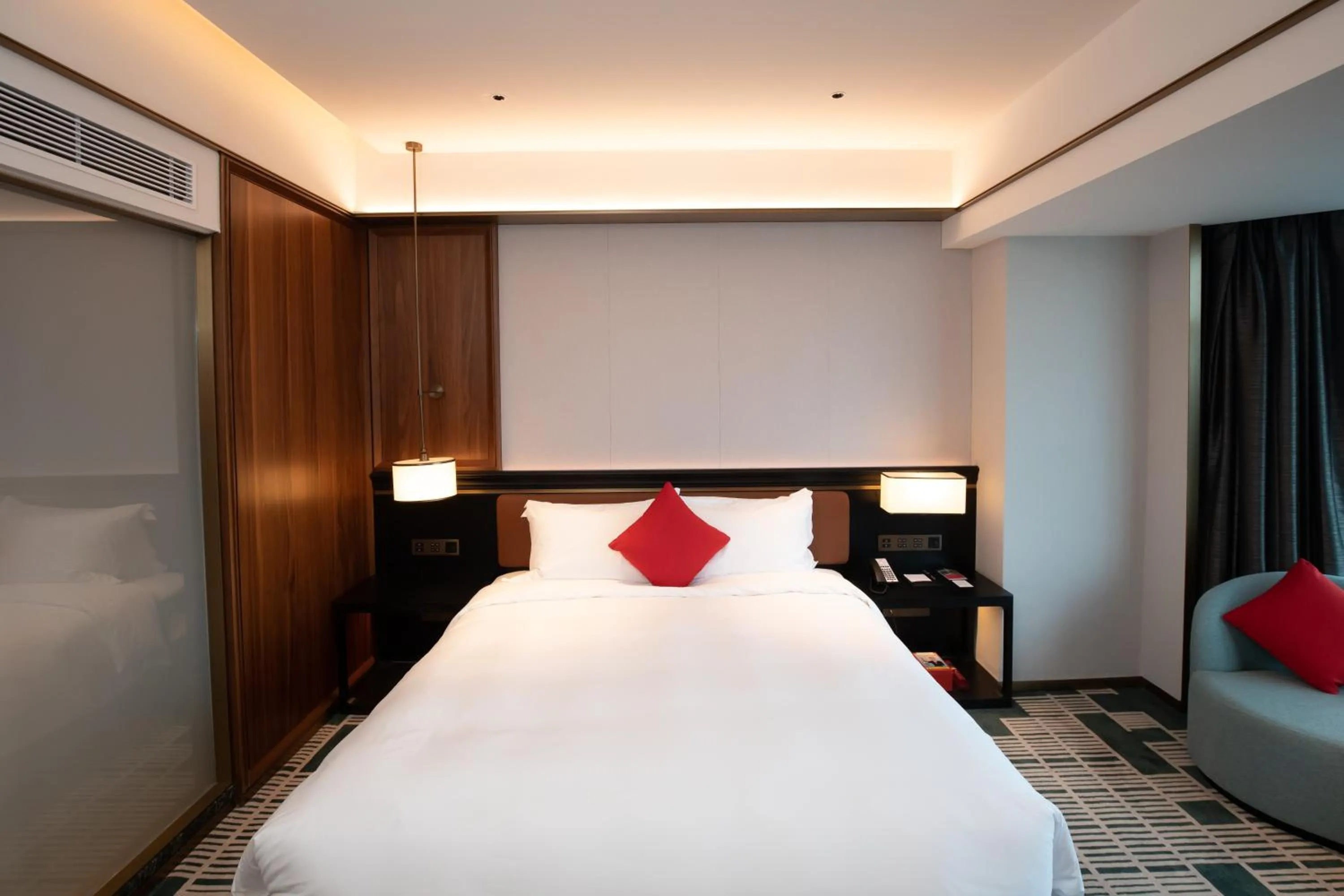 Bed in Ramada by Wyndham Pearl Guangzhou-Canton Fair Free Shuttle Bus