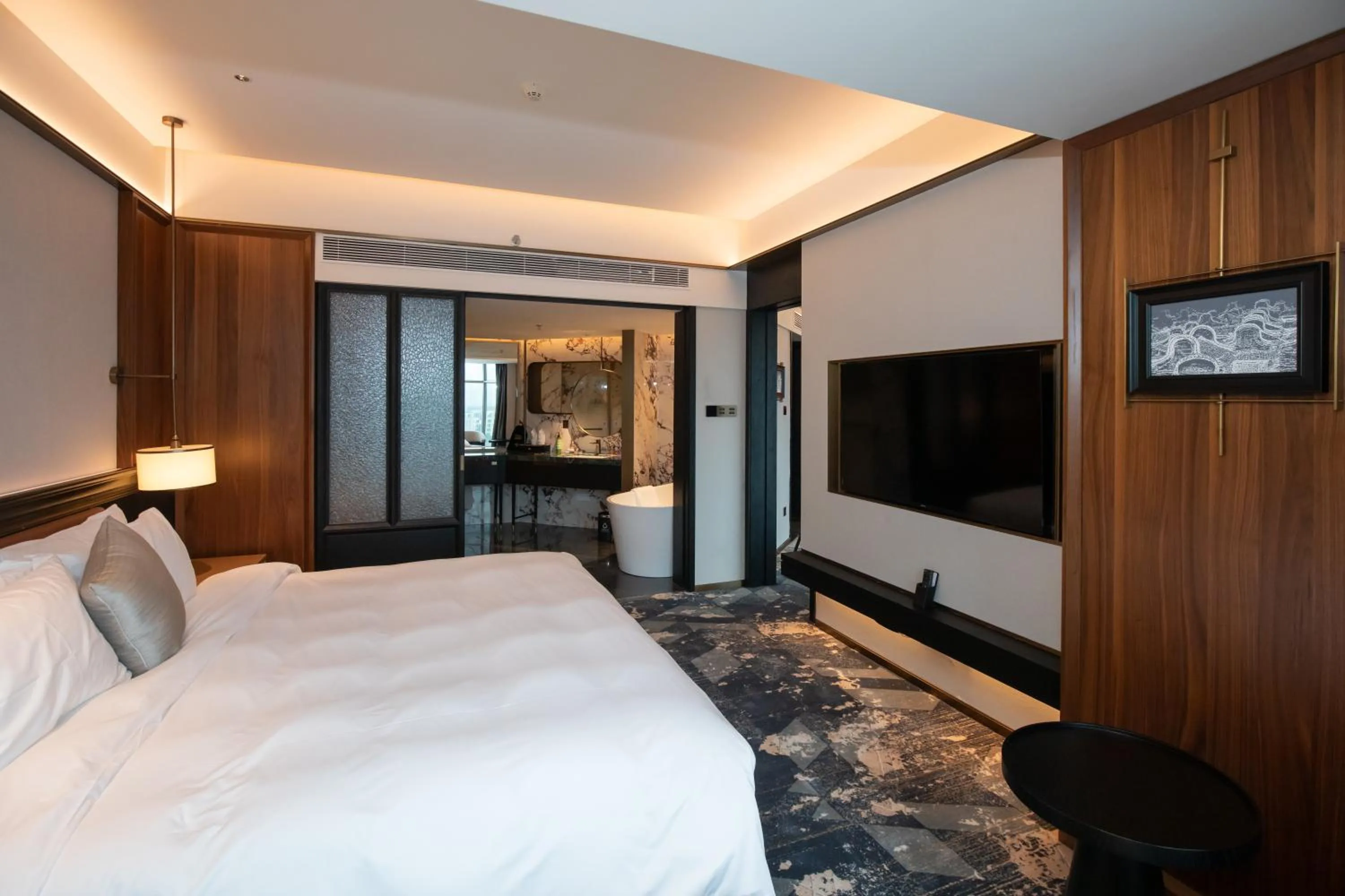 Bed in Ramada by Wyndham Pearl Guangzhou-Canton Fair Free Shuttle Bus