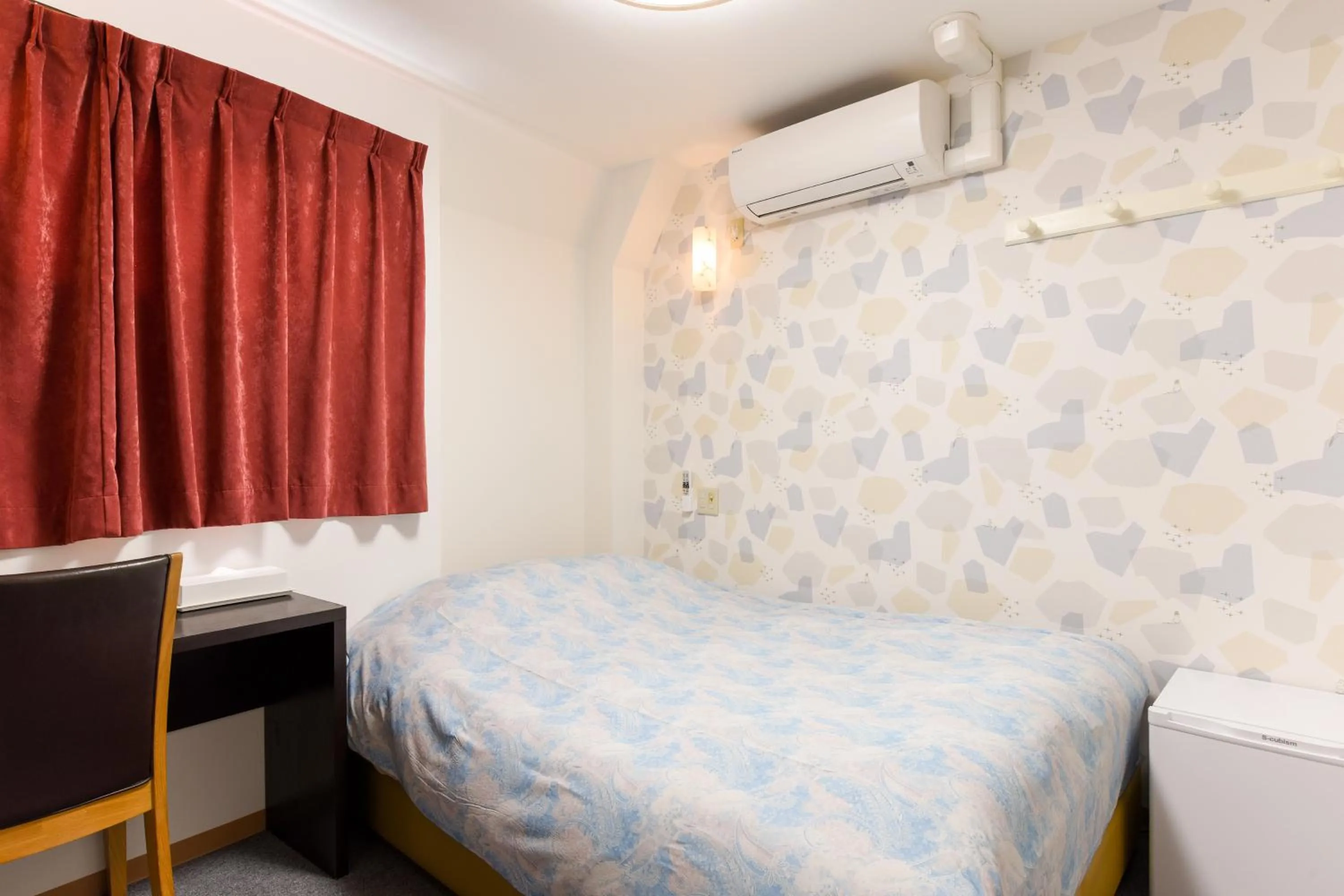 Bed in Otsuka Town Hotel