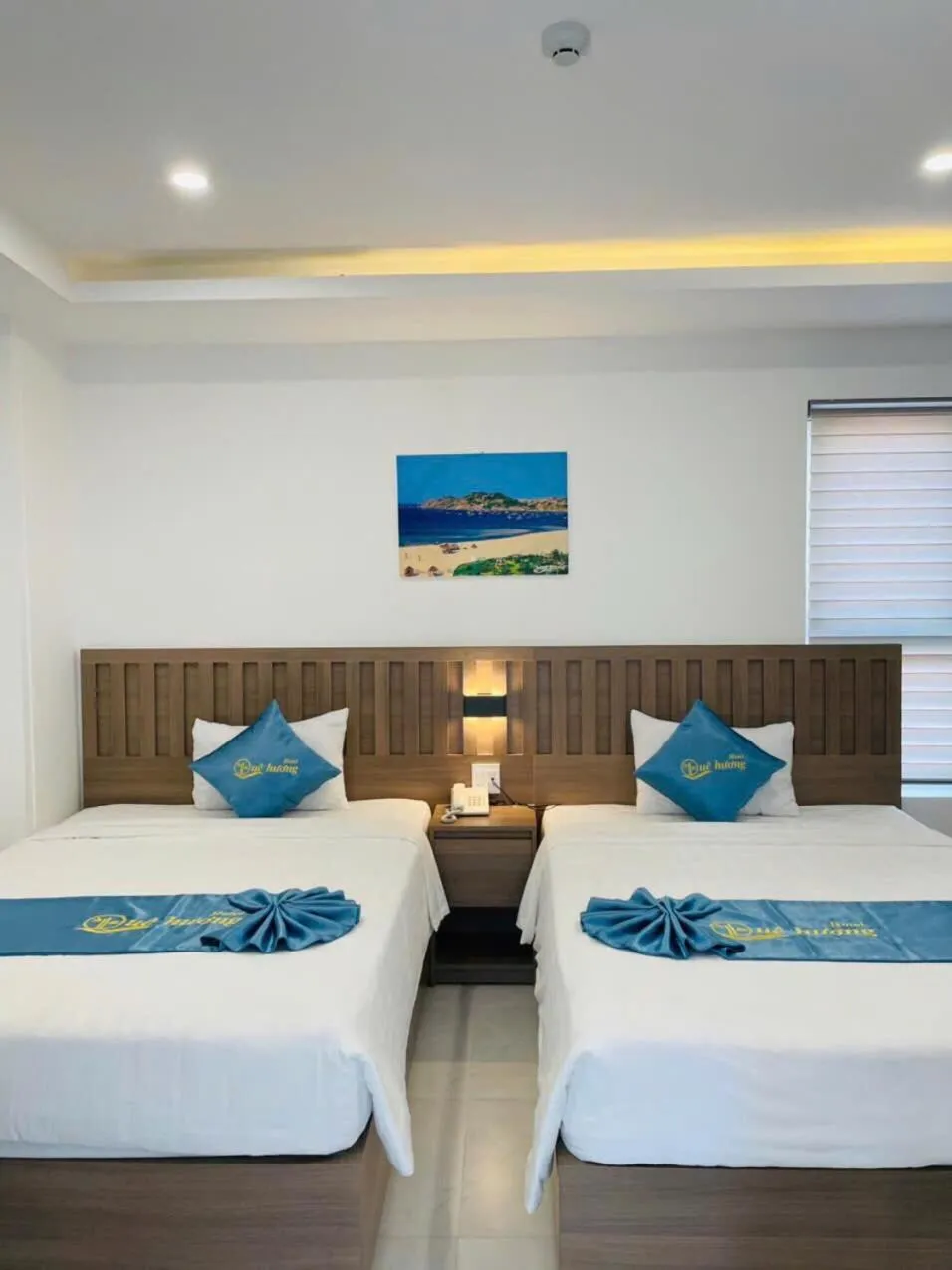 Bed in QUE HUONG HOTEL