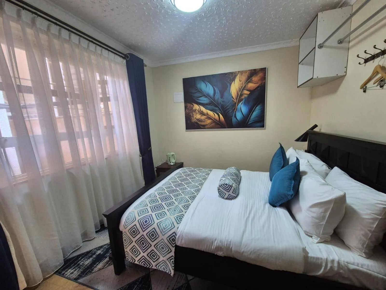 Photo of the whole room, Bed in Asyana Gardens