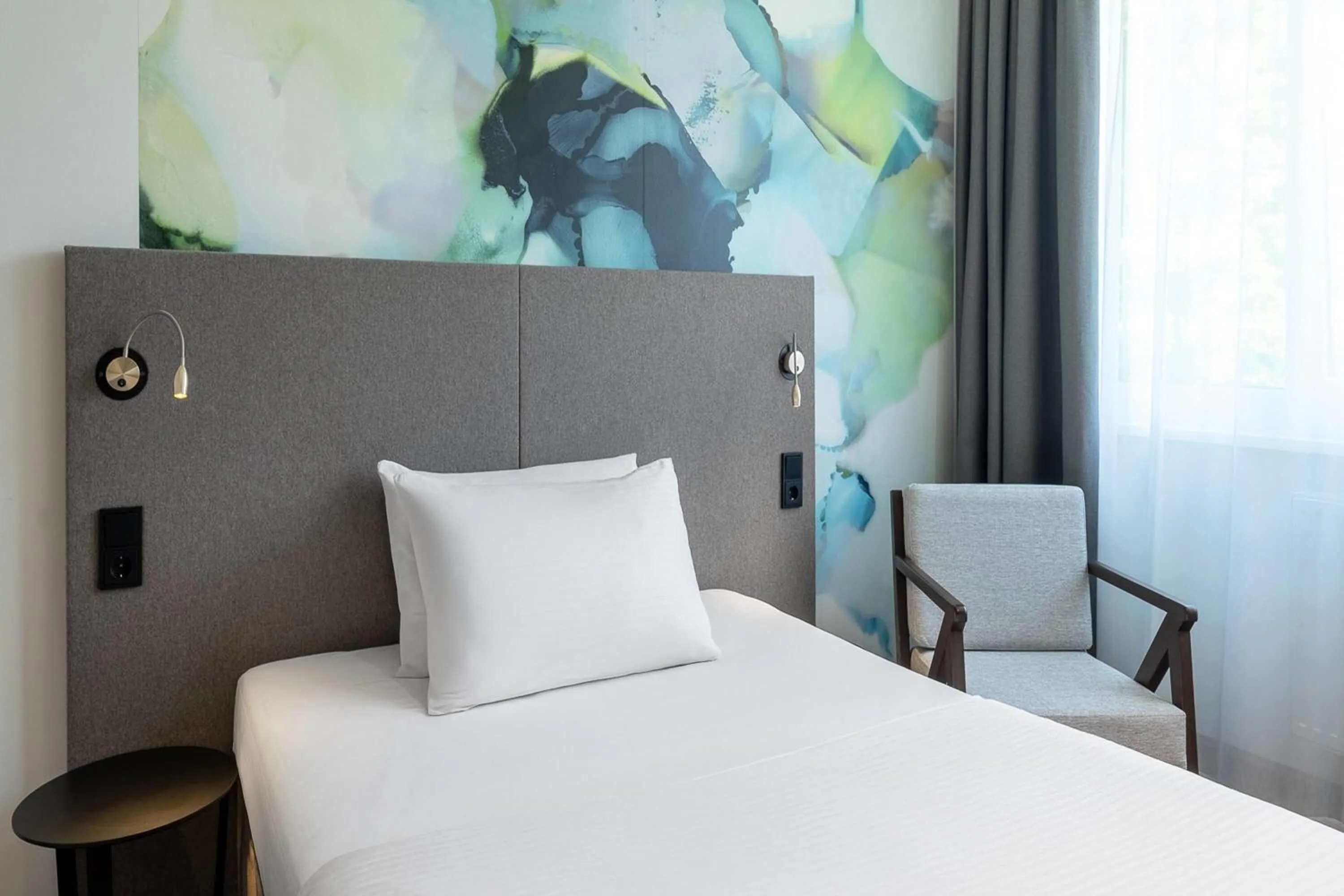 Photo of the whole room, Bed in Wyndham Garden Munich Messe