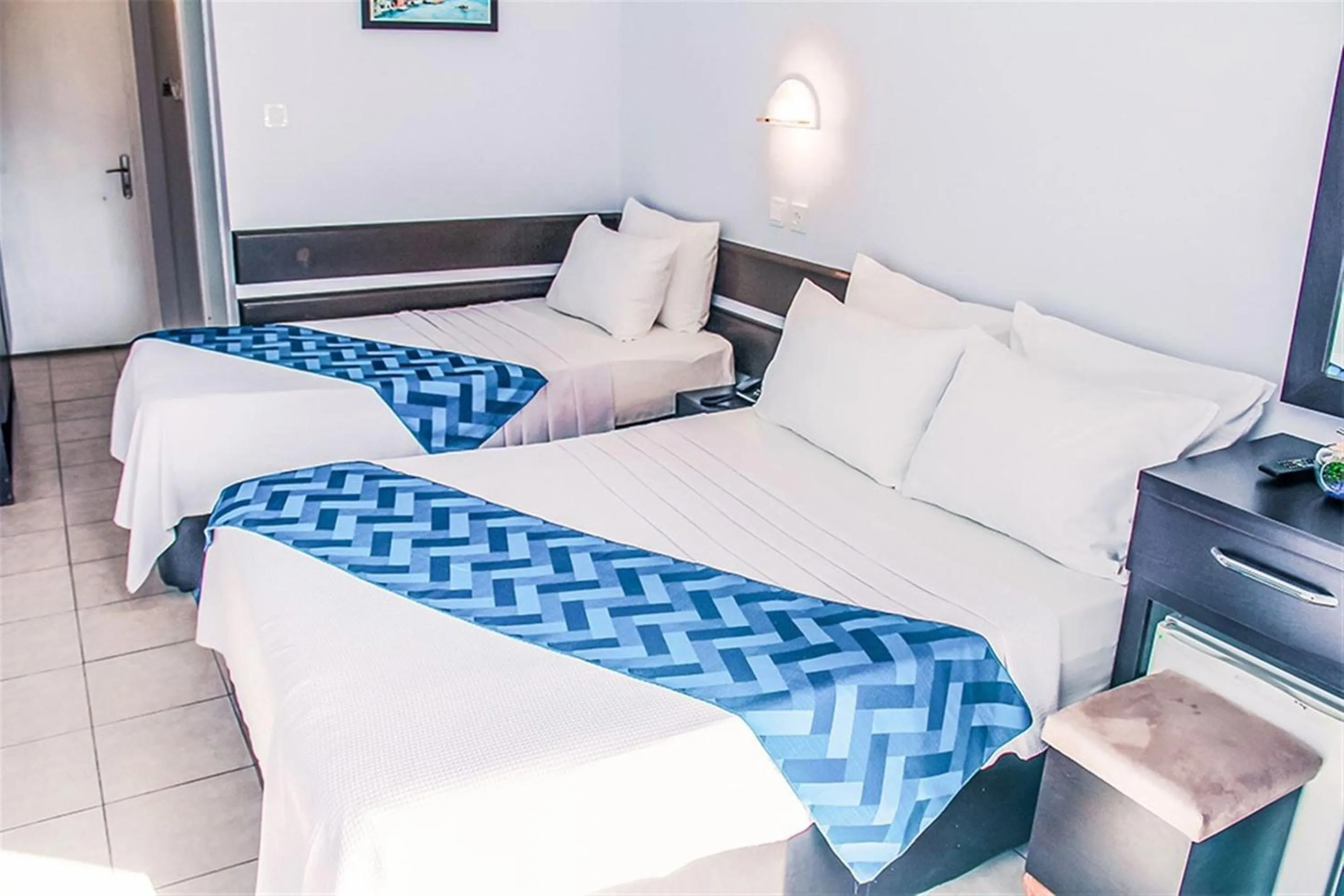 Bed in Yaman Life Hotel