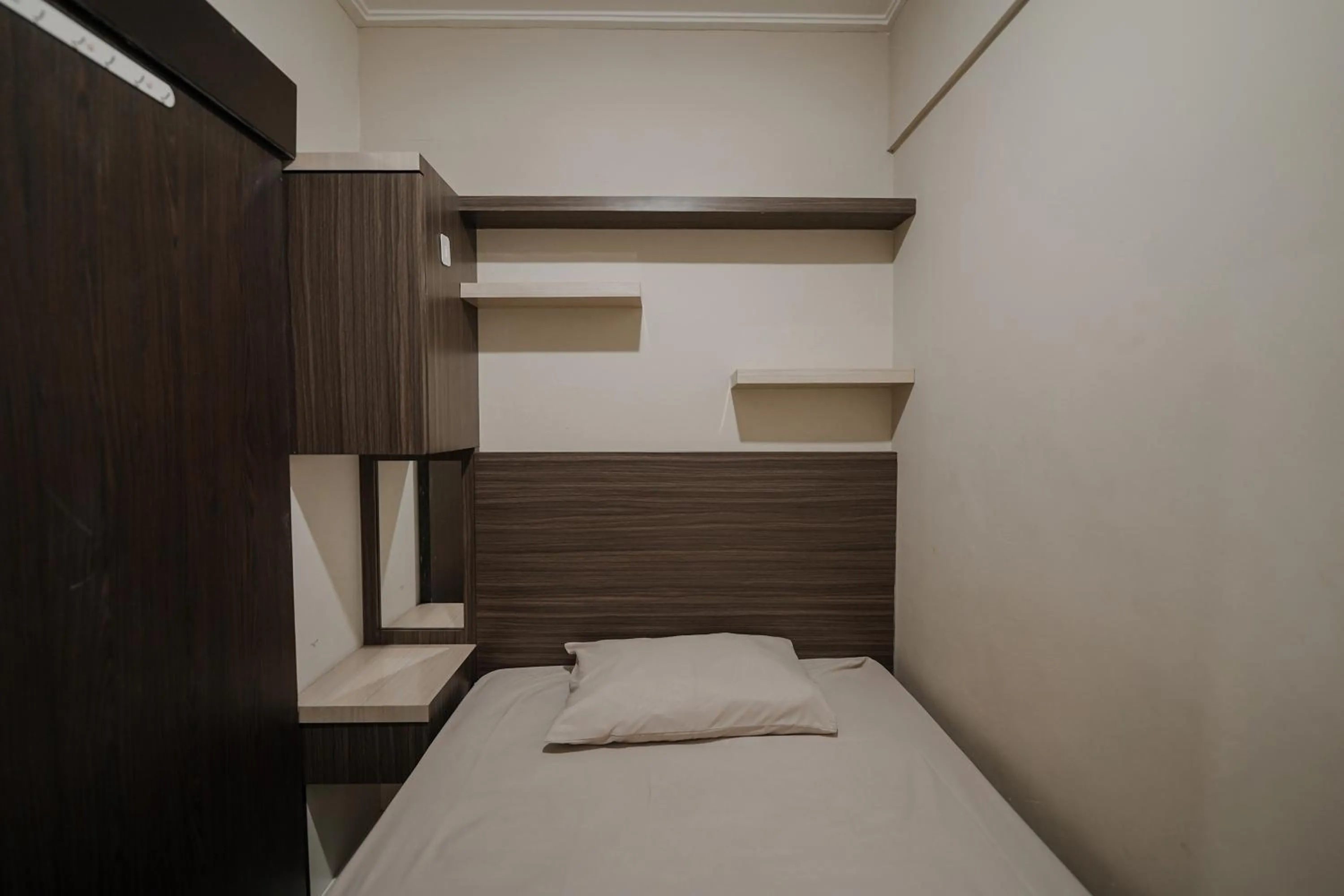 Bed in The Jarrdin by Bethania Pro