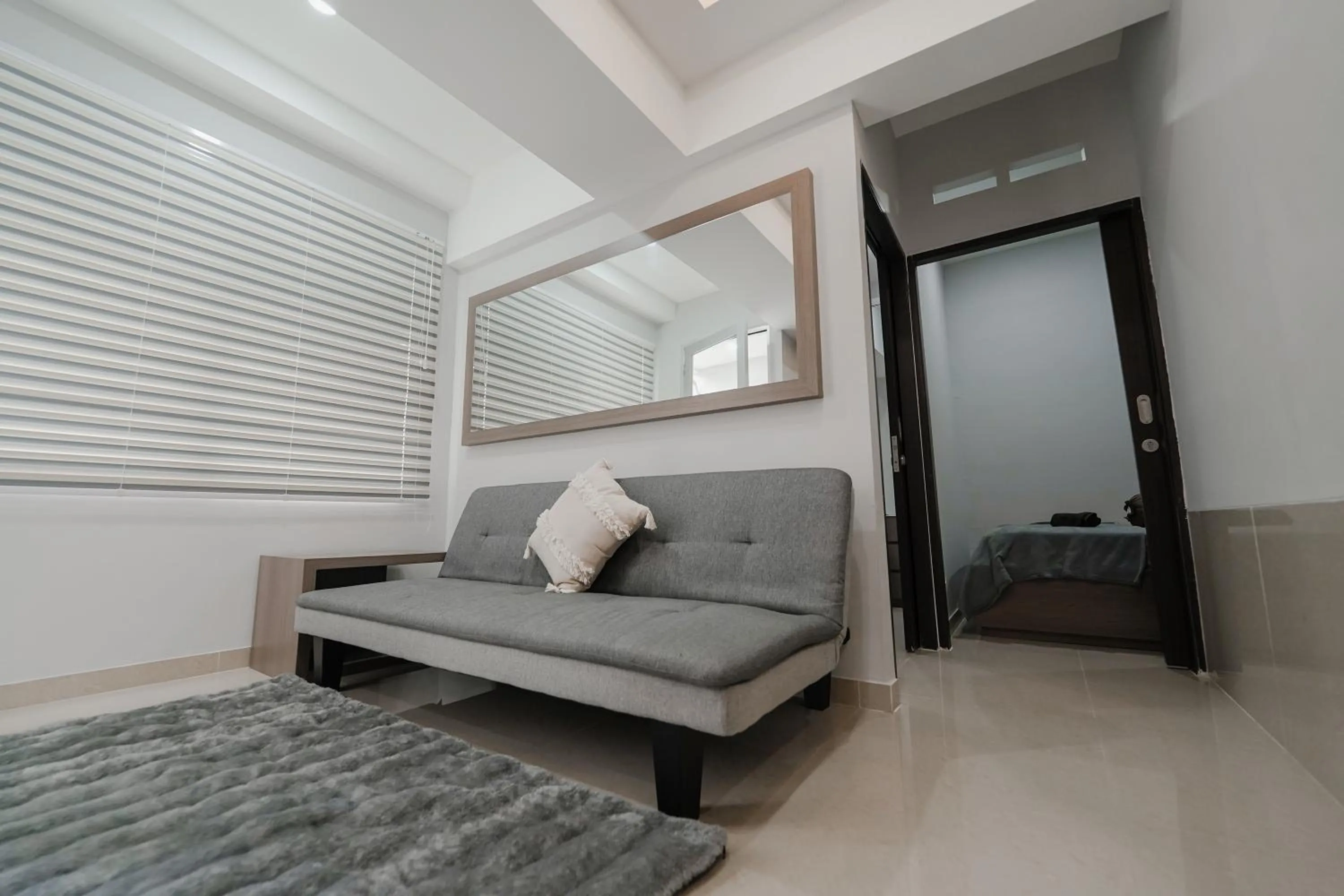 Living room, Bed in The Jarrdin by Bethania Pro