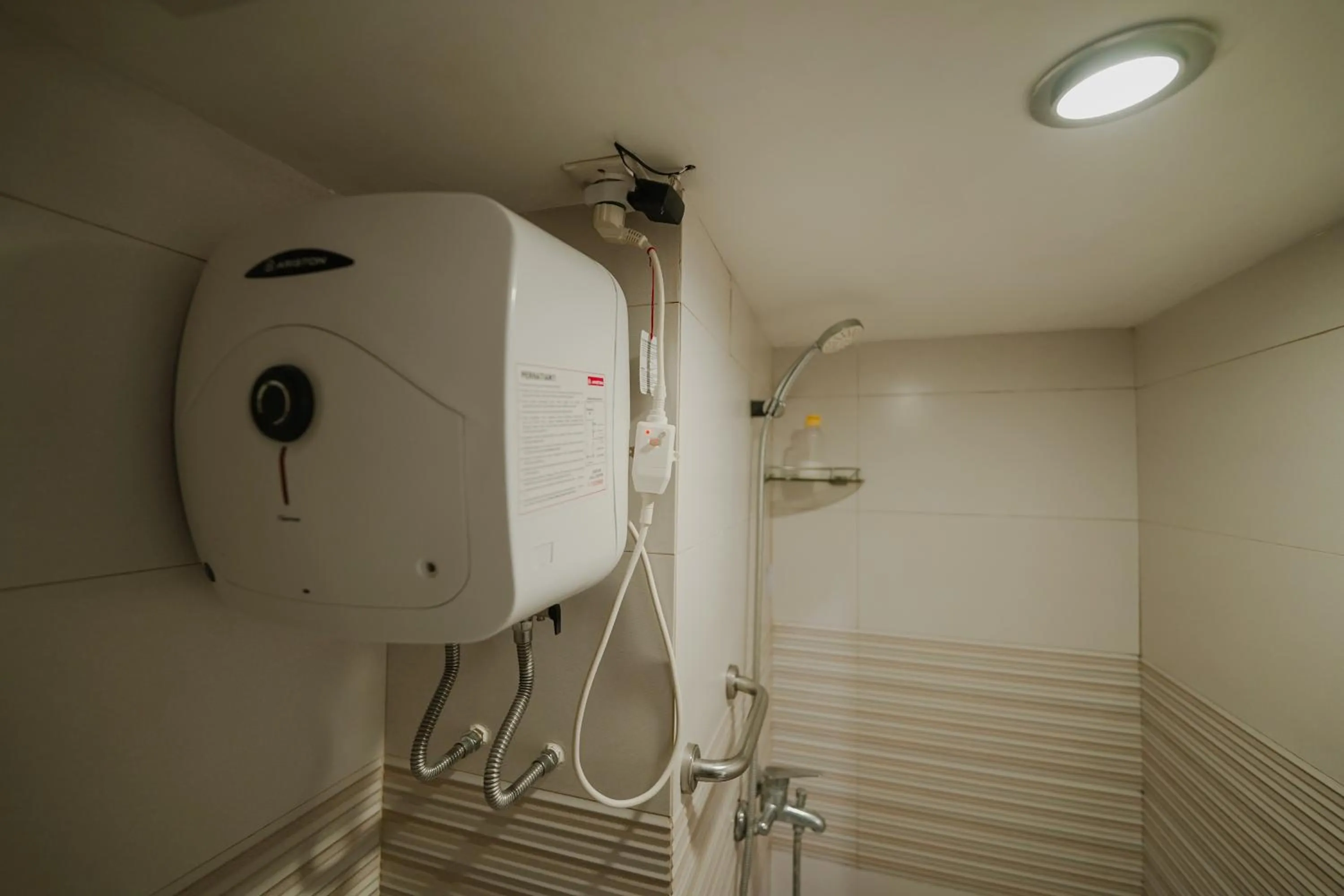 Bathroom in The Jarrdin by Bethania Pro