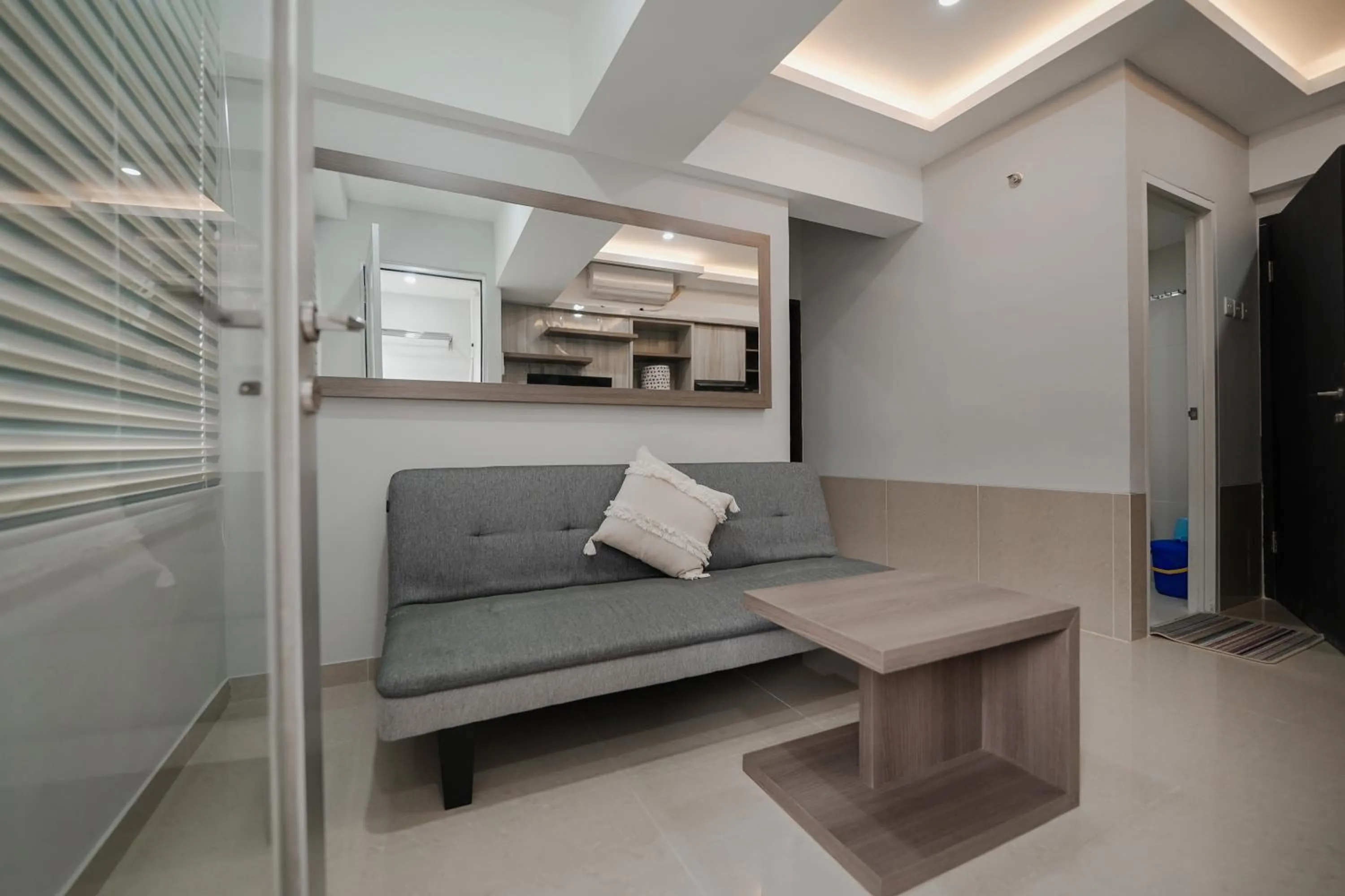 Living room in The Jarrdin by Bethania Pro