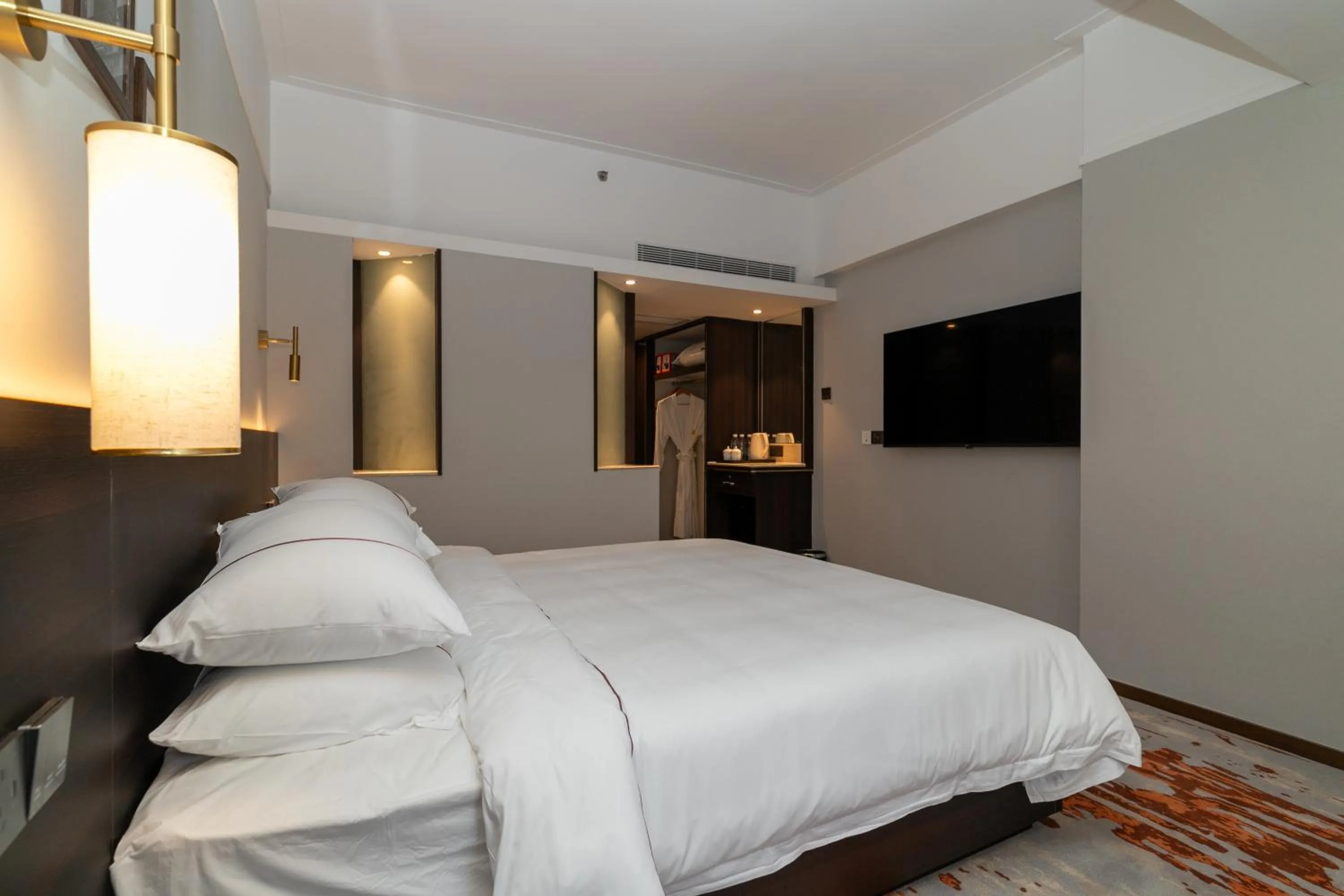 Bed in Guangdong Victory Hotel