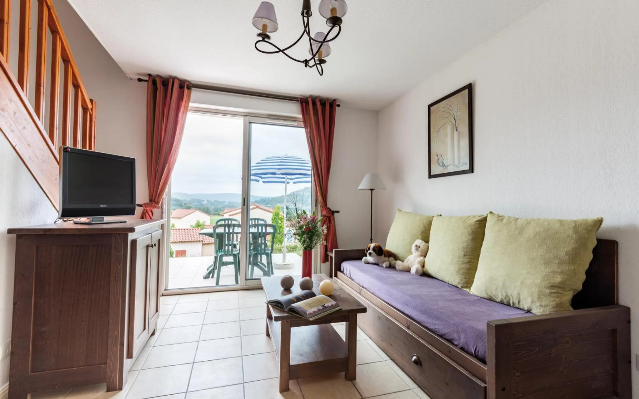 Living room in Le Domaine des Cazelles by Ateya Vacances