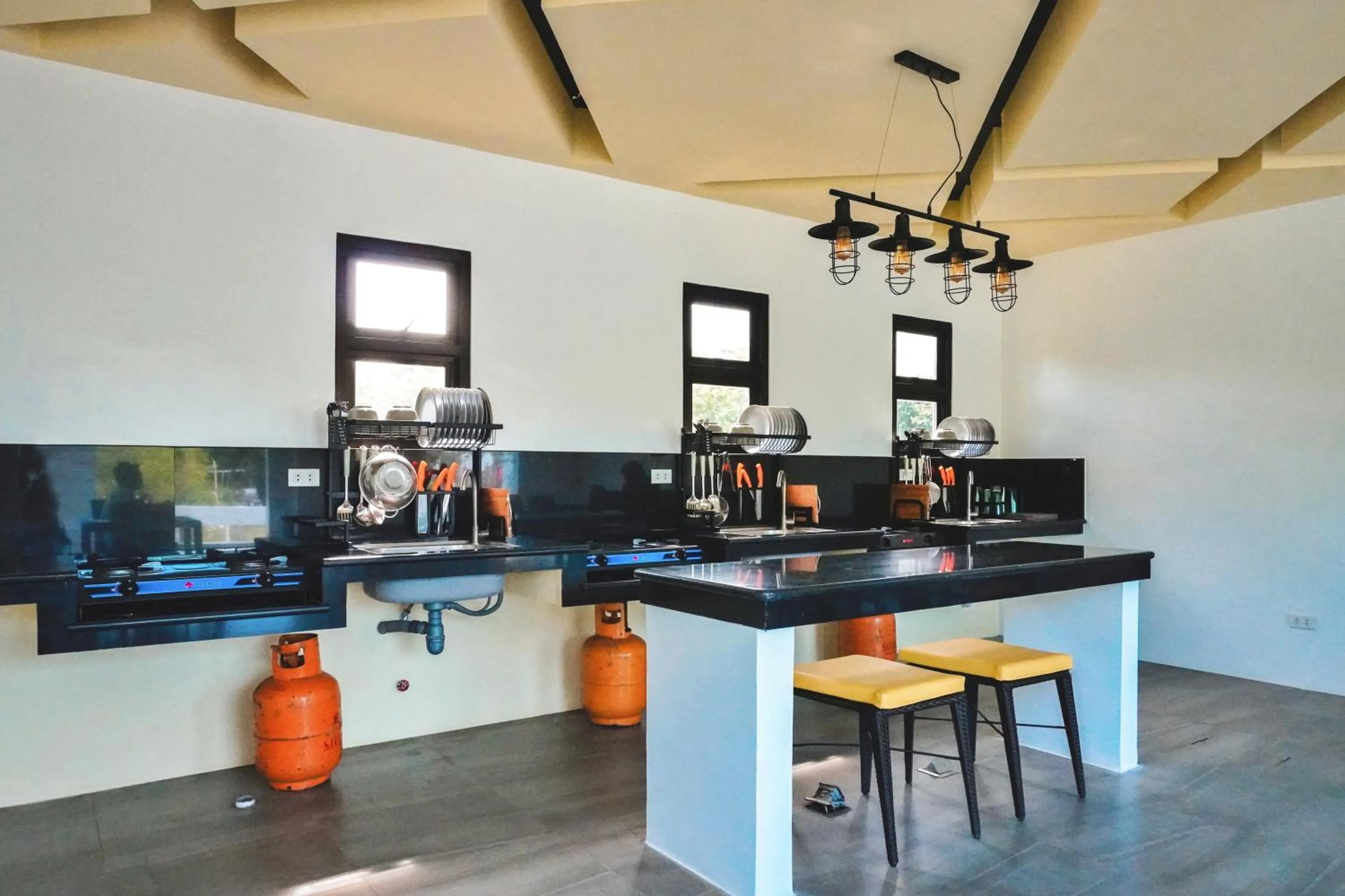 Communal kitchen in Rold and Roub Home Suites powered by Cocotel