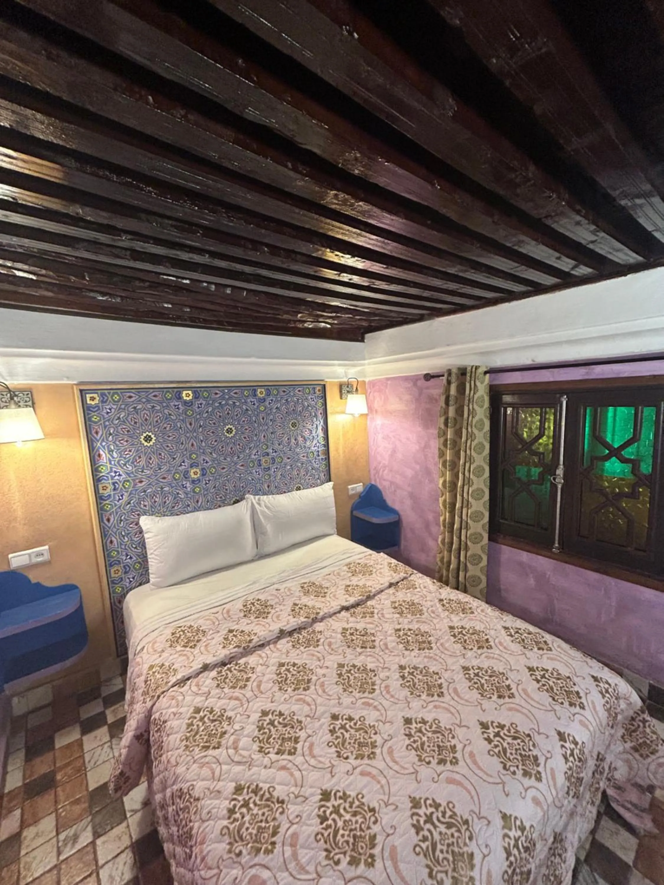 Bed in RIAD ESMERALDA By Dar Ouezzani