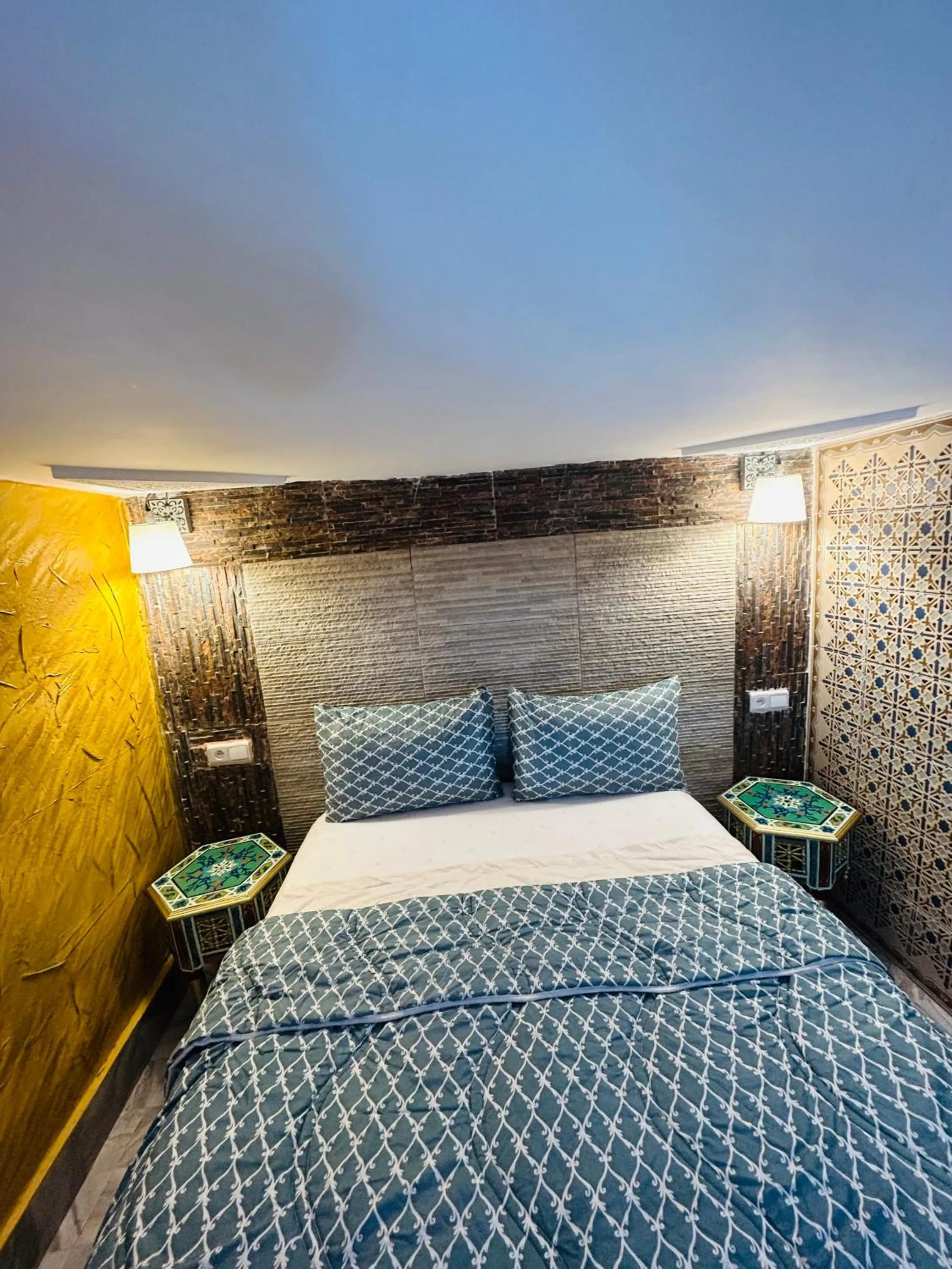 Bed in RIAD ESMERALDA By Dar Ouezzani