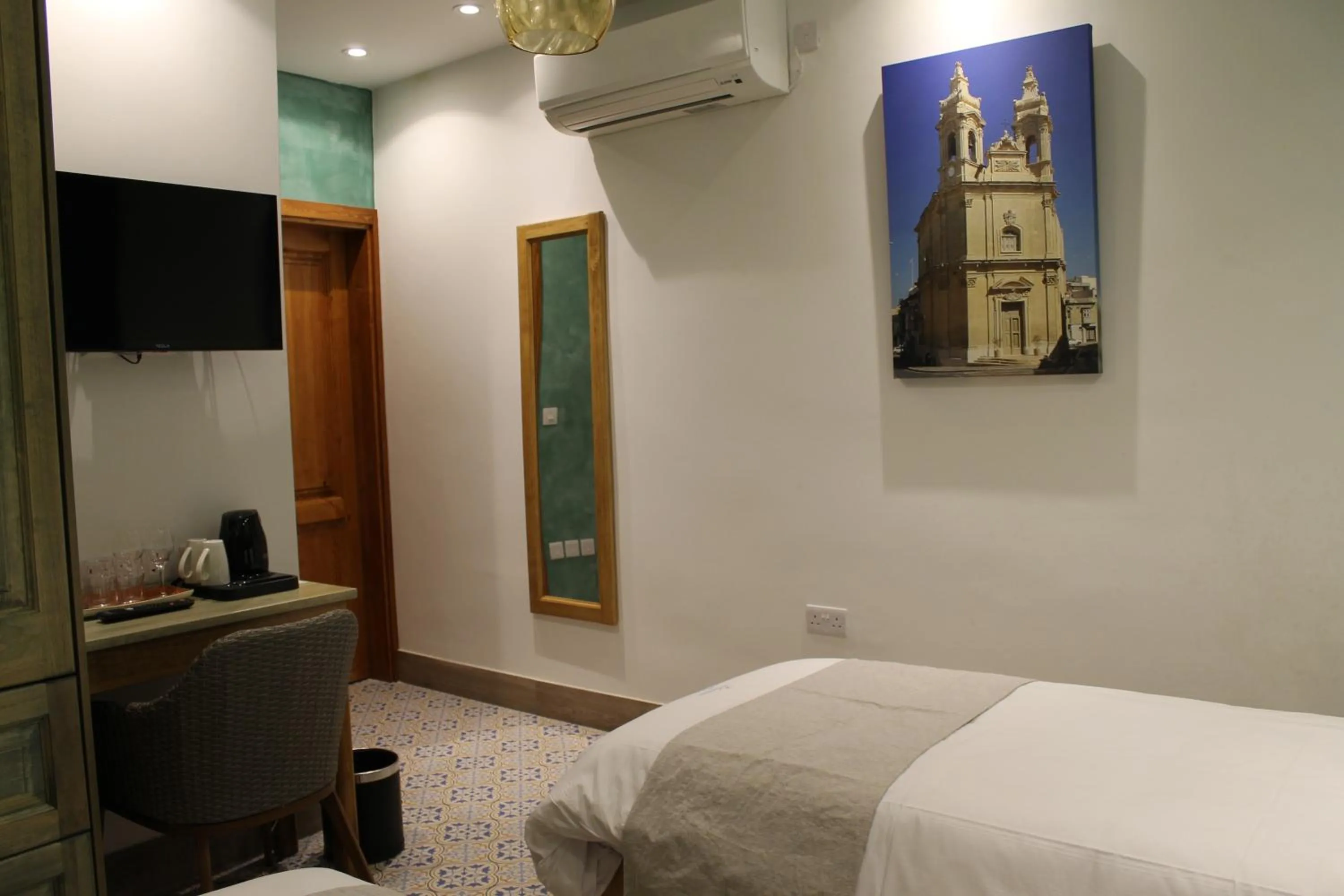 TV and multimedia, Bed in Palazzino Nina Boutique Hotel