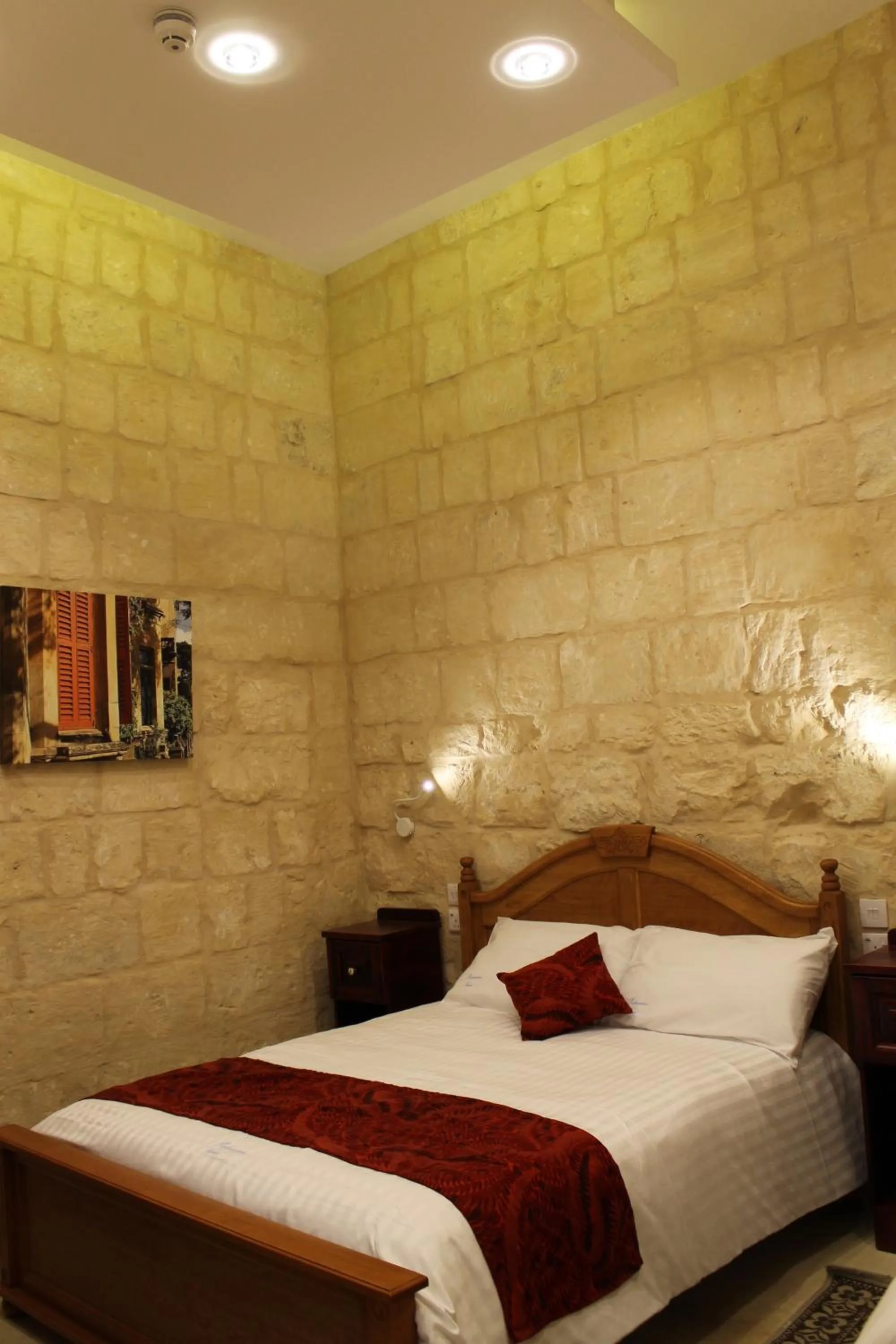 Bed in Palazzino Nina Boutique Hotel