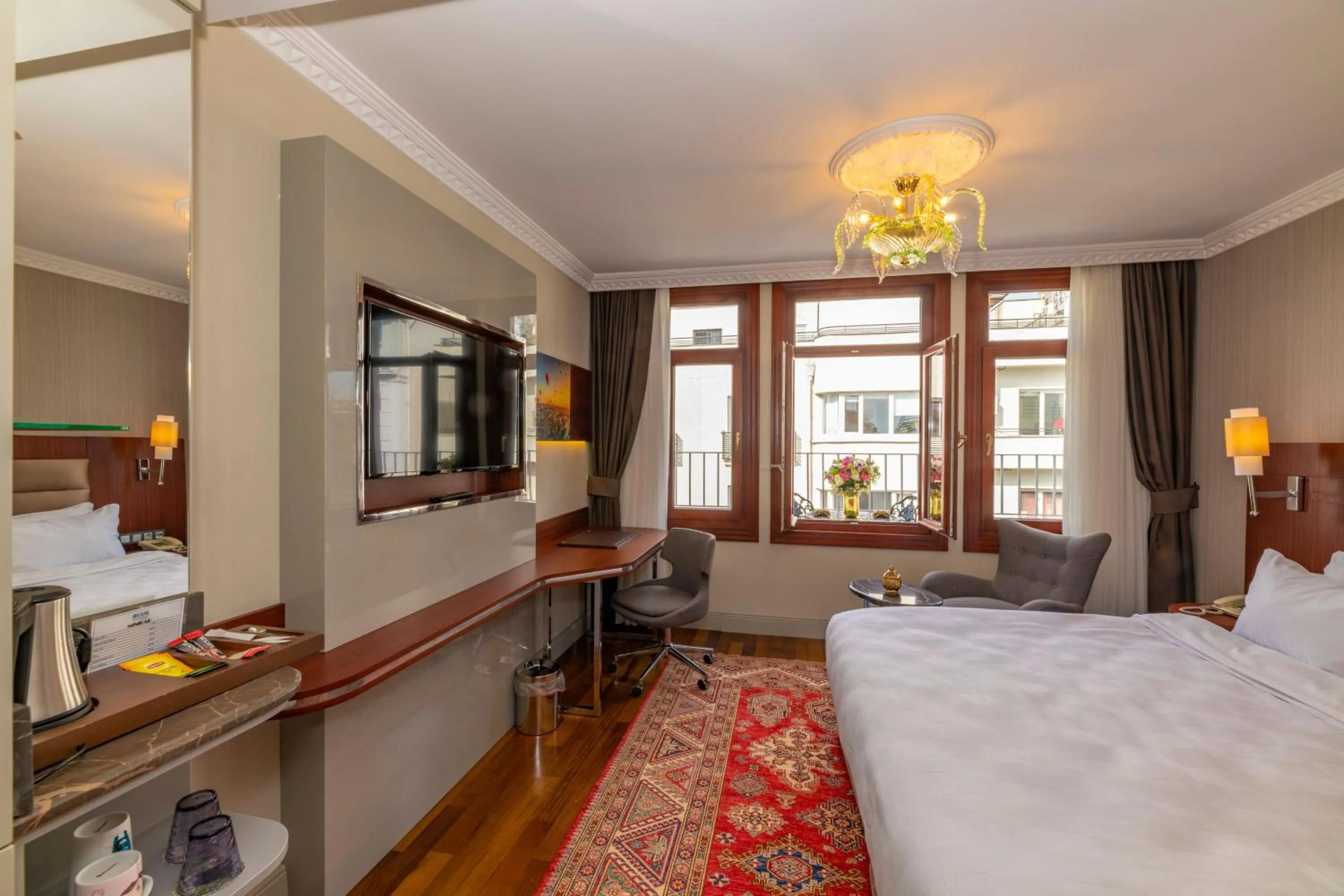 Bed in Blue Gilroy Hotel