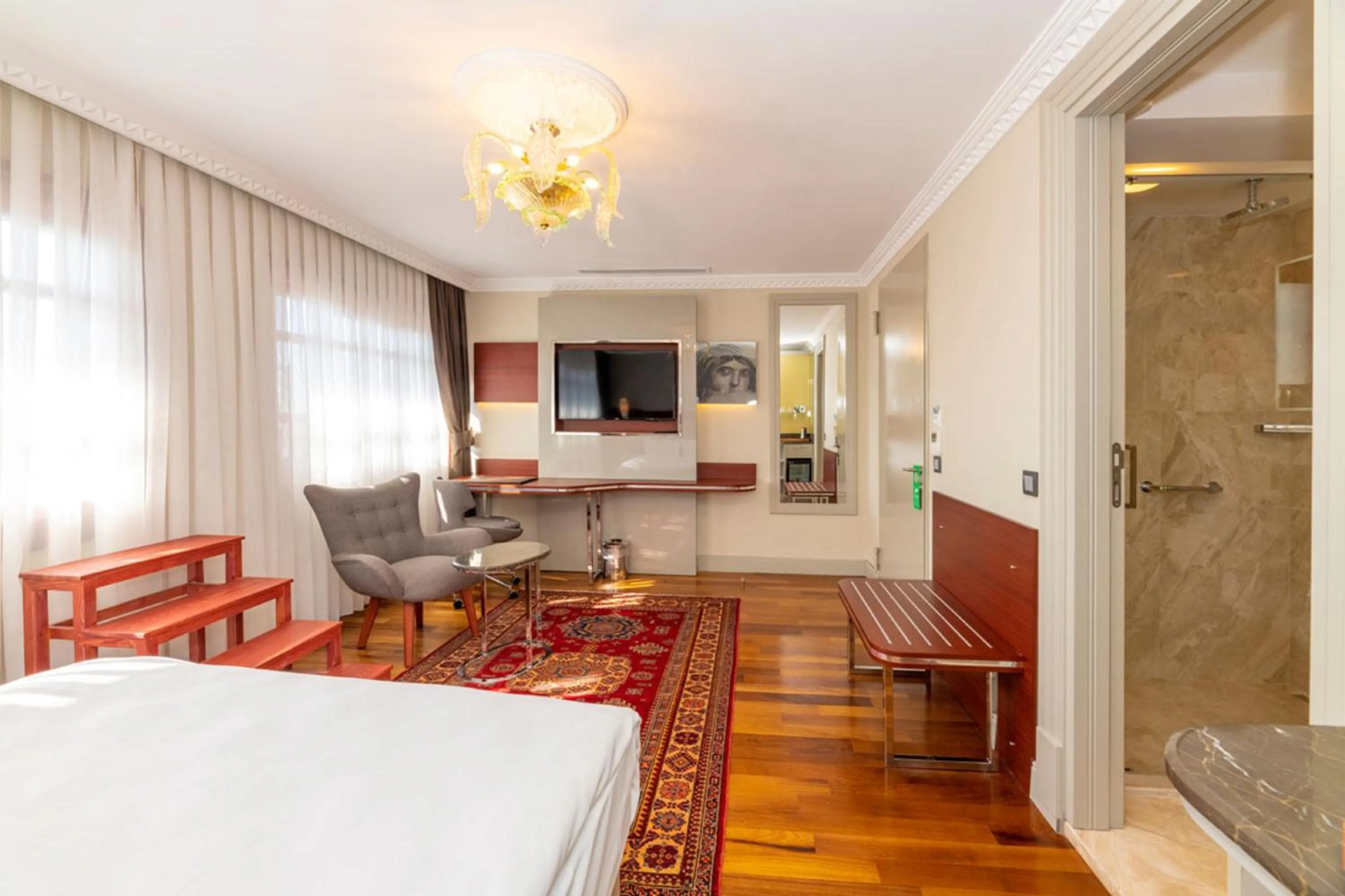 Bed in Blue Gilroy Hotel