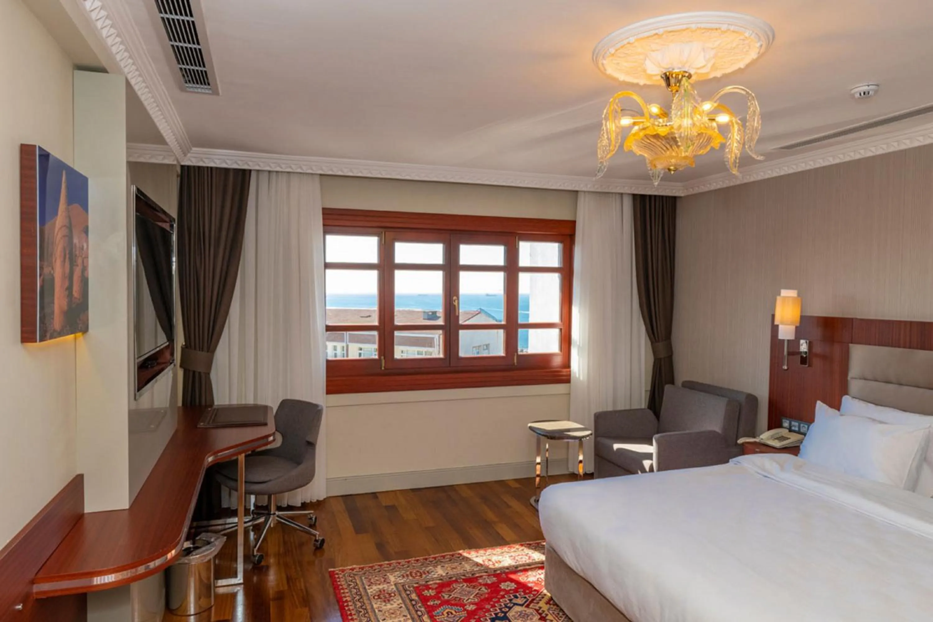 Bed in Blue Gilroy Hotel