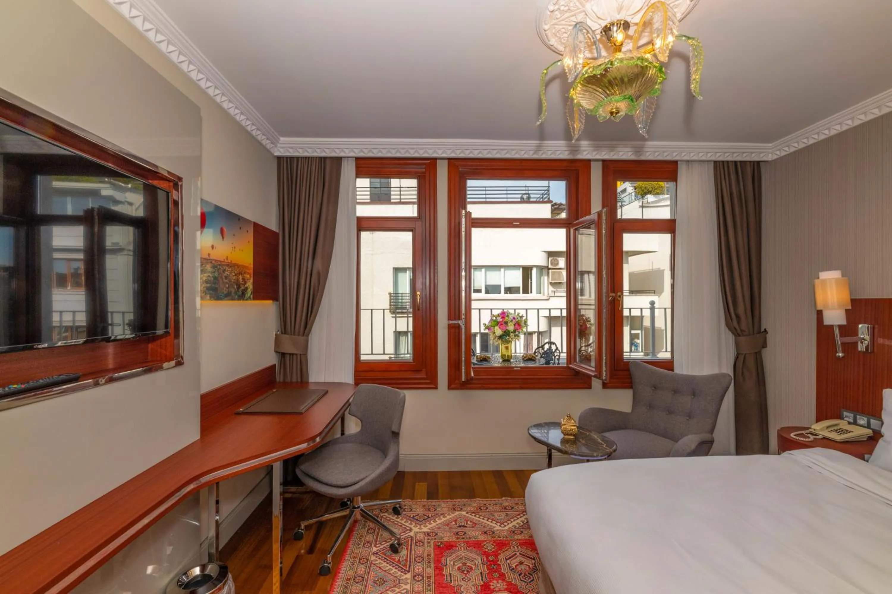 Bed in Blue Gilroy Hotel