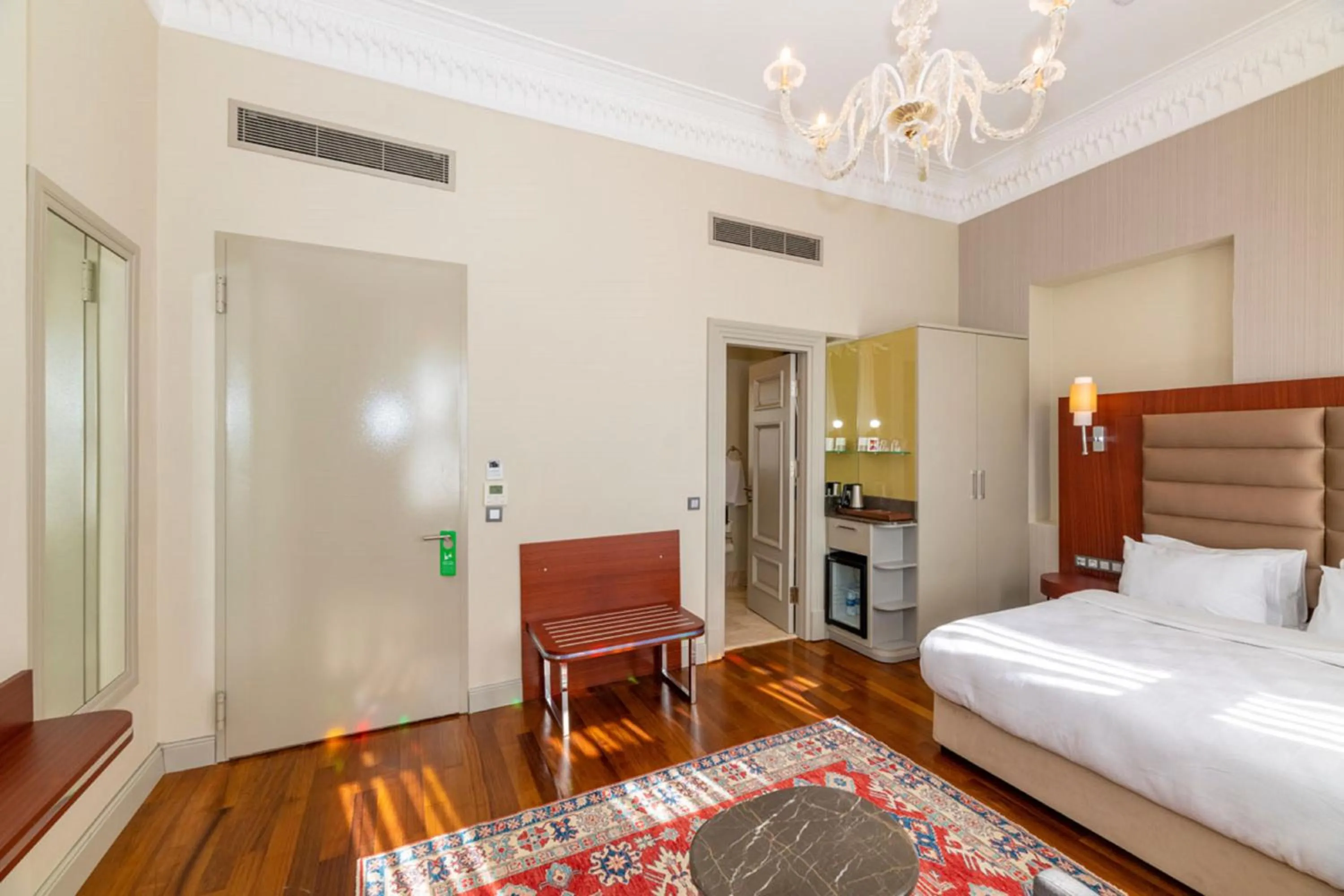 Bed in Blue Gilroy Hotel