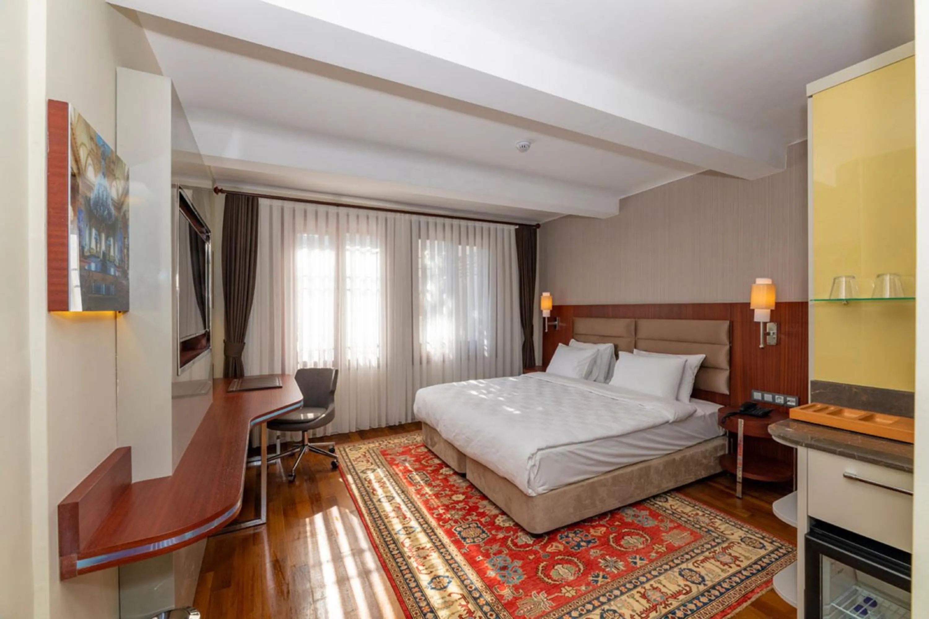 Bed in Blue Gilroy Hotel