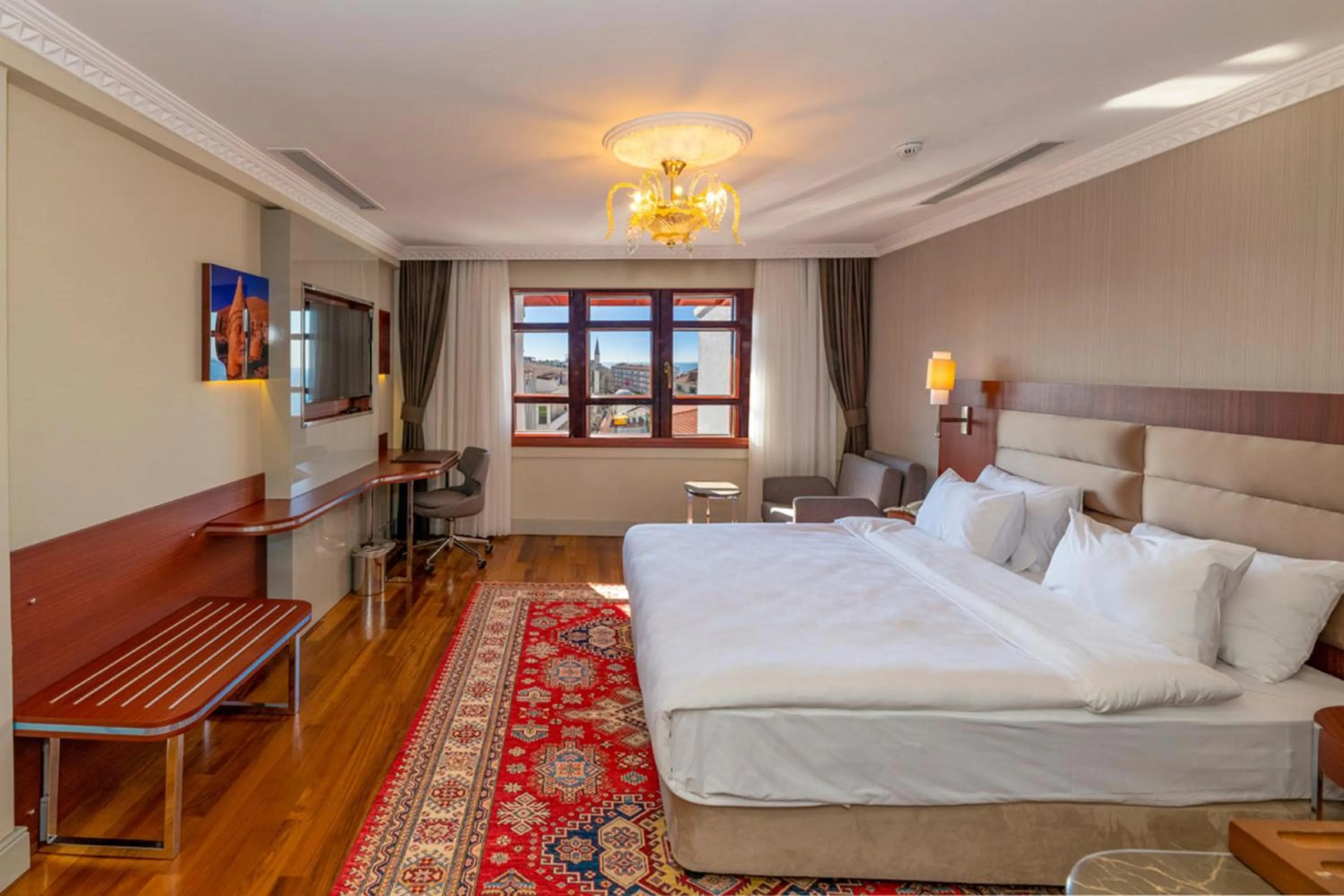 Bed in Blue Gilroy Hotel