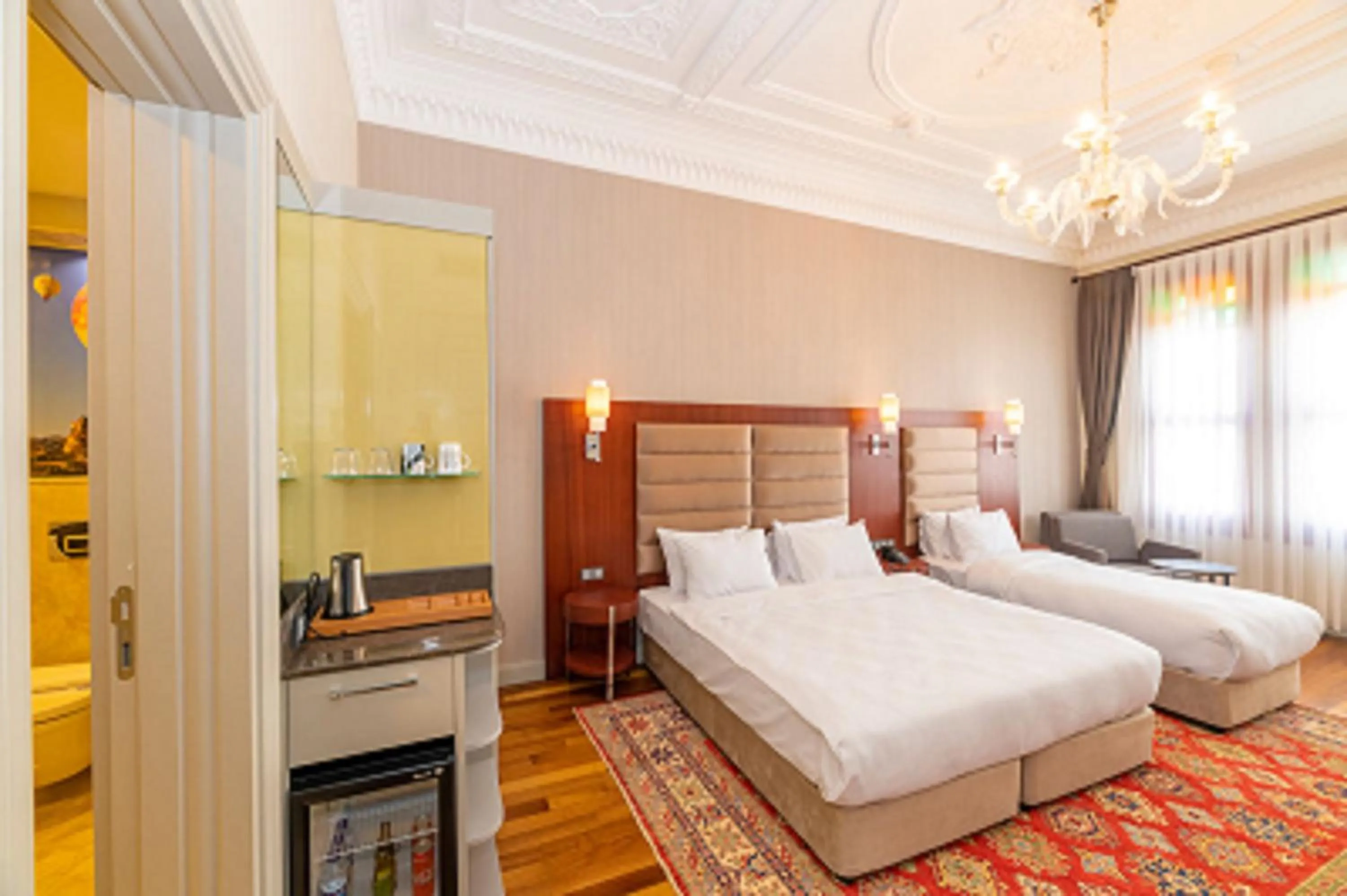 Bed in Blue Gilroy Hotel