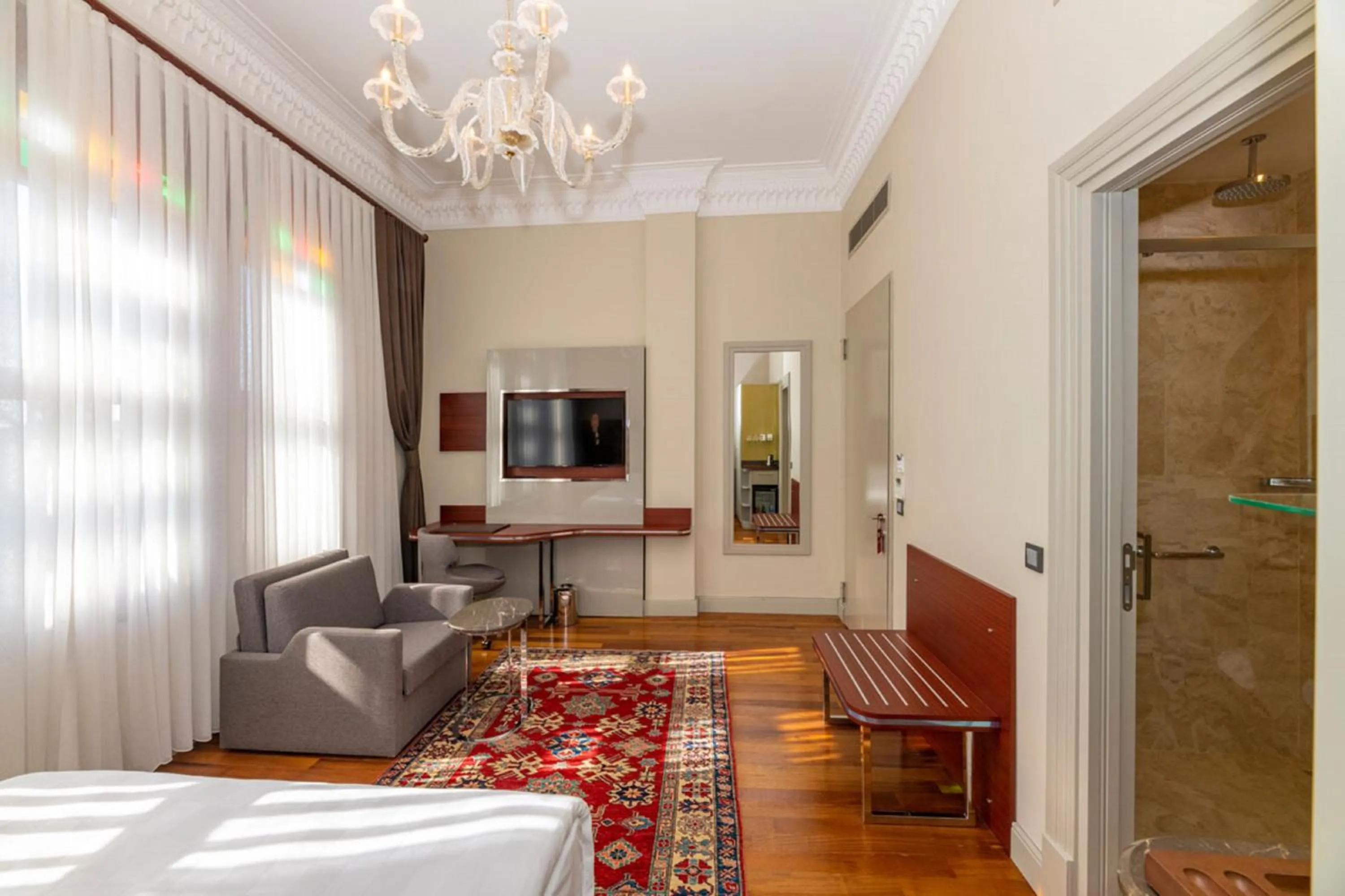 Bed in Blue Gilroy Hotel