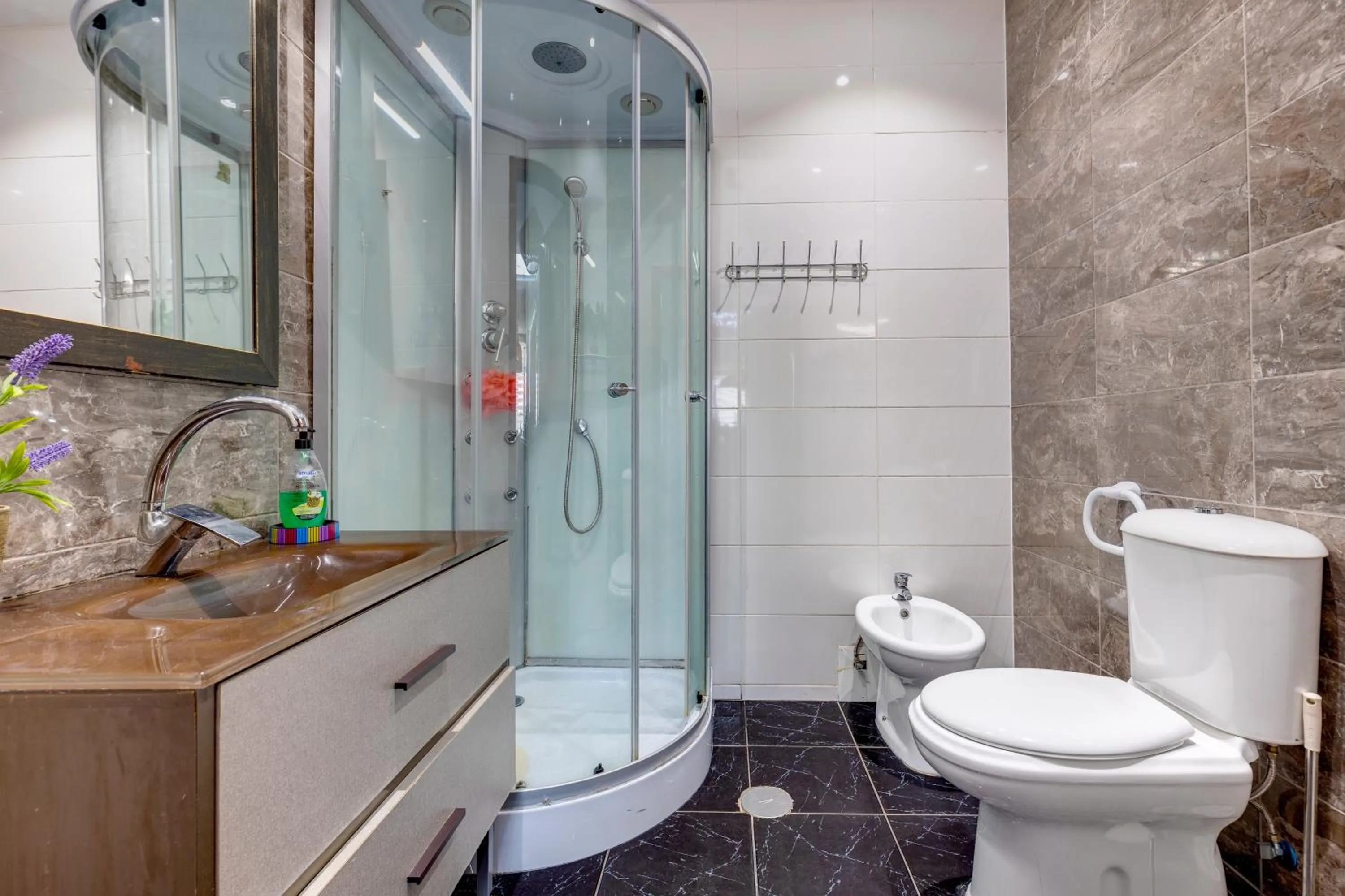 Shower in Garden in Town Hostel